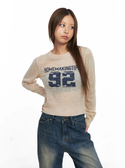 sheer-graphic-cropped-sweater-co510