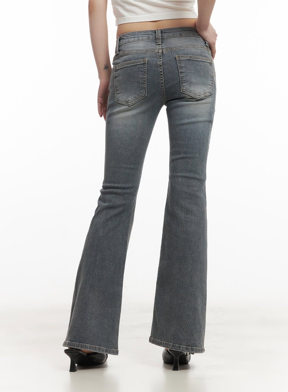 Rachel Washed Bootcut Jeans with Hip Pads CF518 in gray, back view on model, low-waist washed denim with dual back pockets and hip pad shaping, bootcut flare silhouette.
