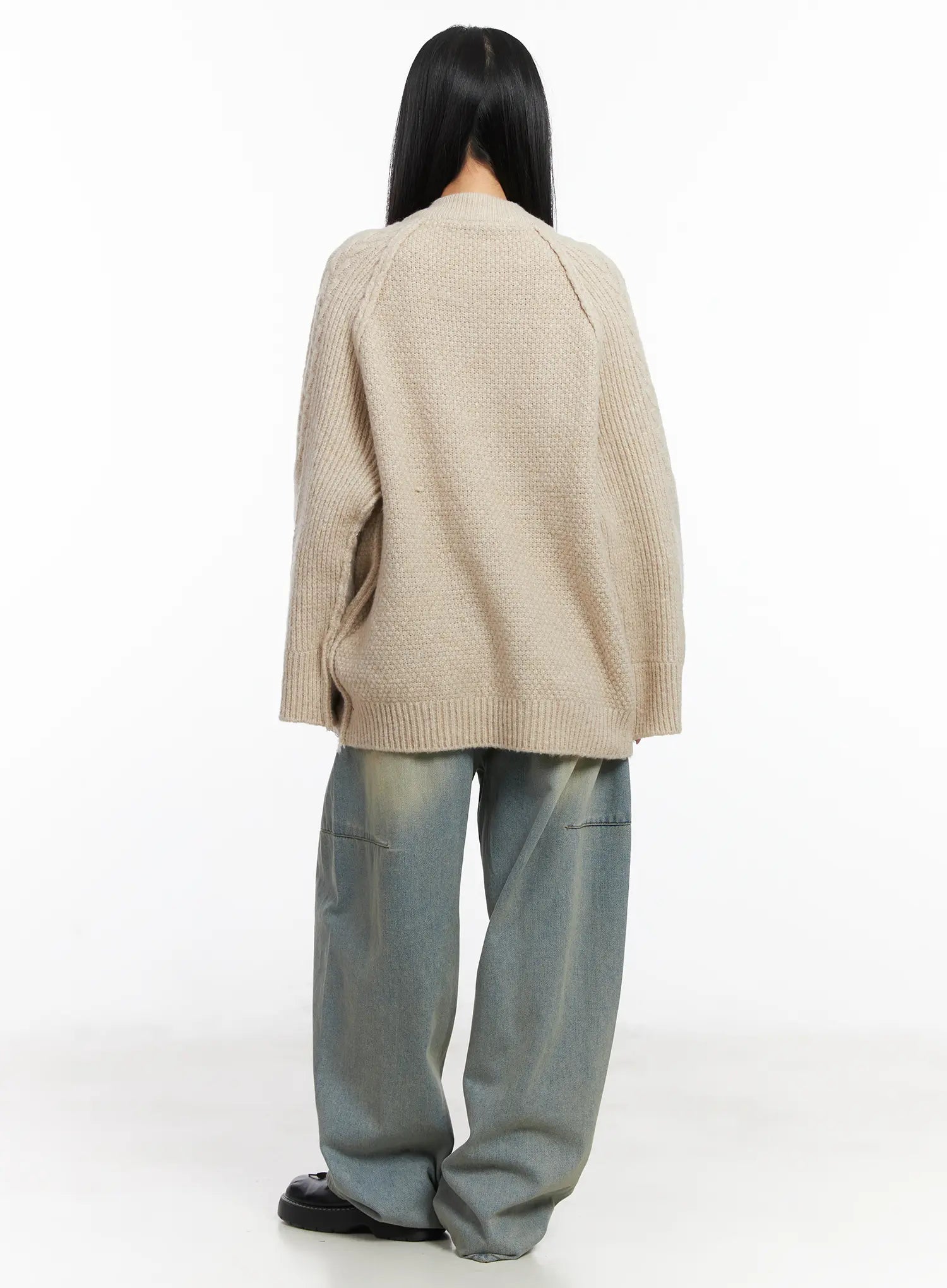 Lyla Washed Wide Leg Jeans CD530 in light blue, back view on model, wide leg cotton denim with washed finish and visible panel seam, paired with oversize beige cable-knit sweater.
