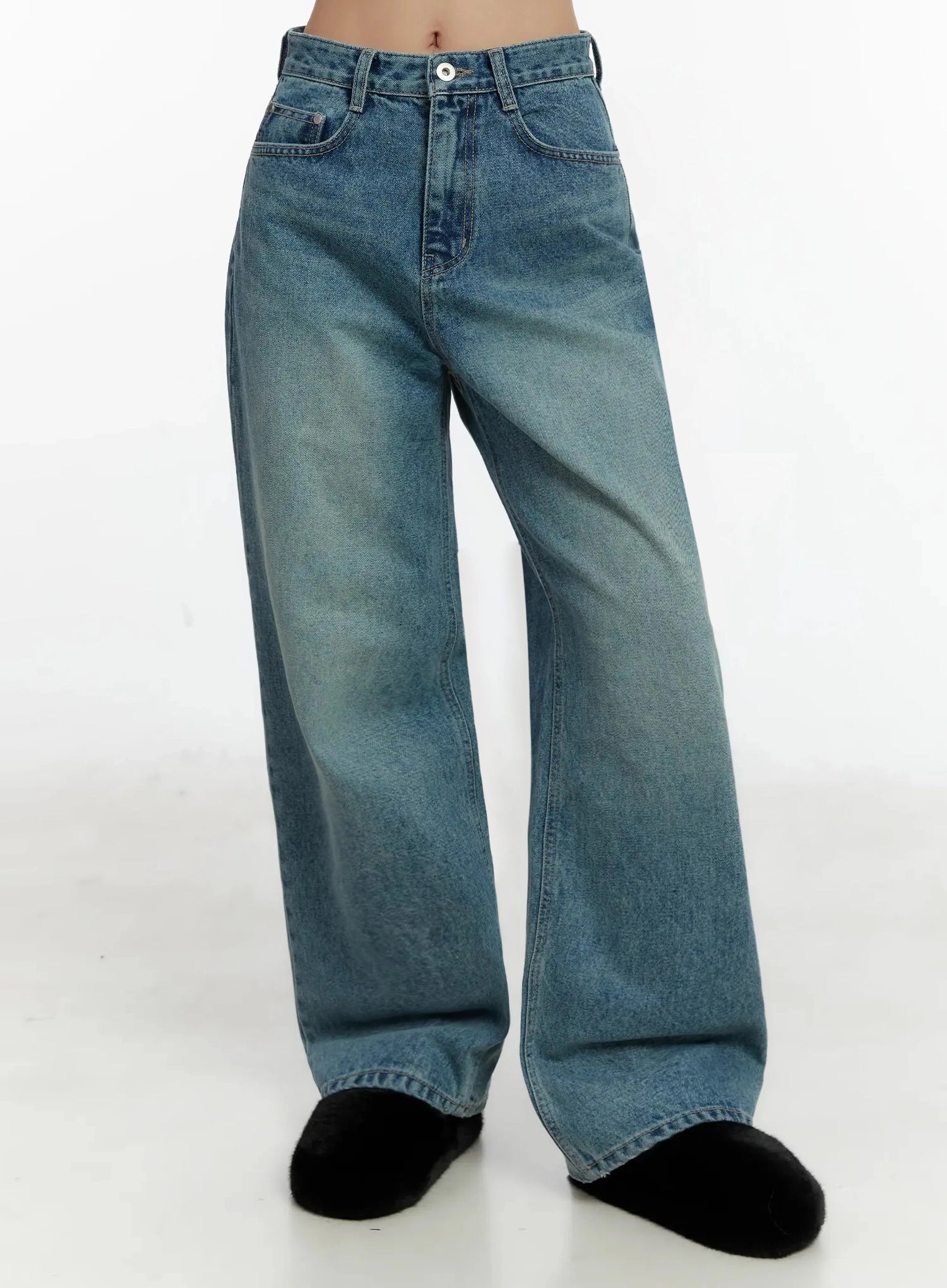 Pixi Straight Leg Jeans ID525 in blue, front three-quarter shot on model (waist-to-hem), washed straight-leg cotton denim showing relaxed wide leg silhouette and pocket stitching, with black slides.