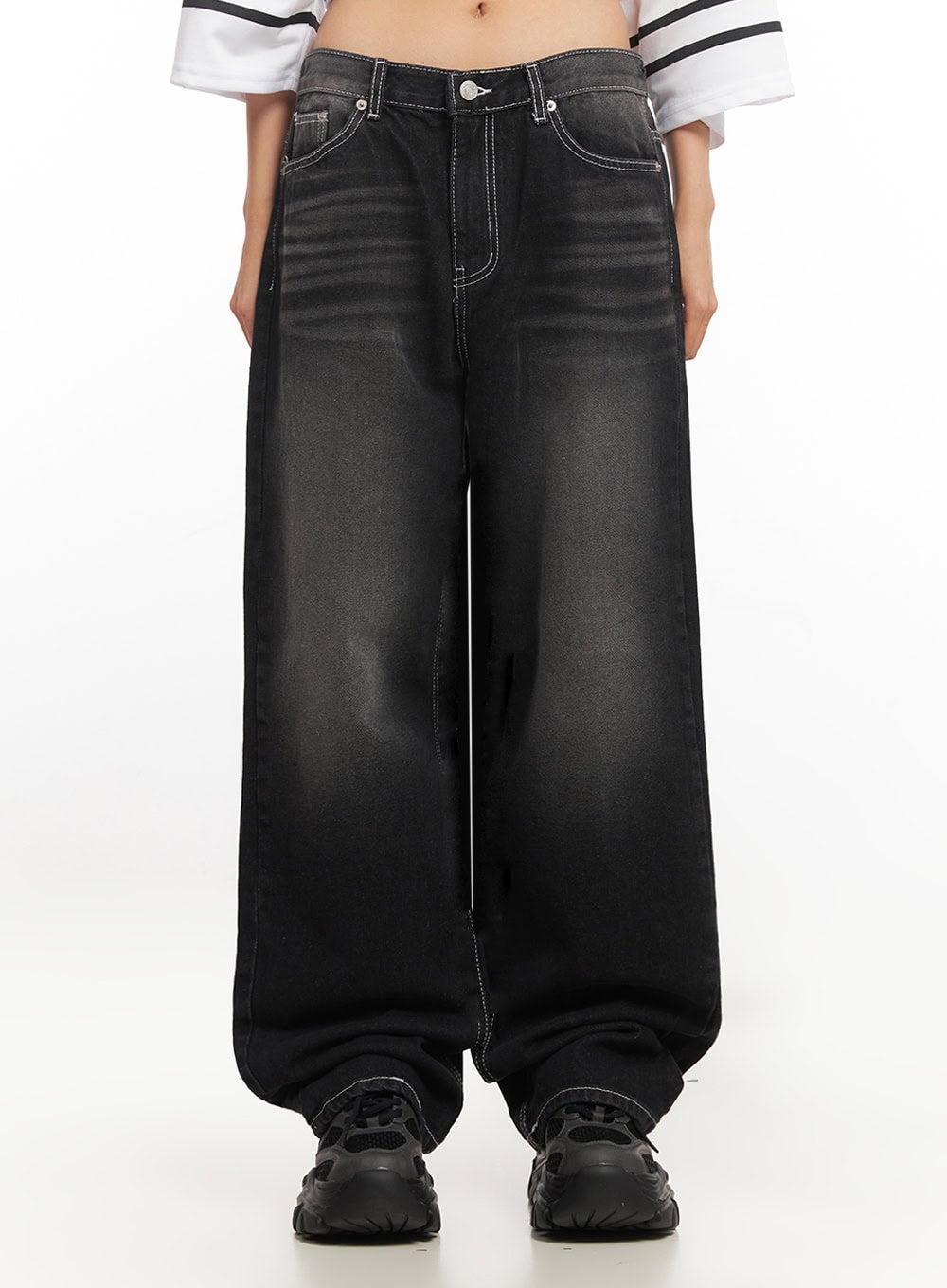 Alexis Stitched Wide-Leg Jeans IA504 in washed black, front waist-to-hem close-up on model, washed cotton denim showing contrast white stitching, mid-rise waist and ultra-wide leg silhouette.