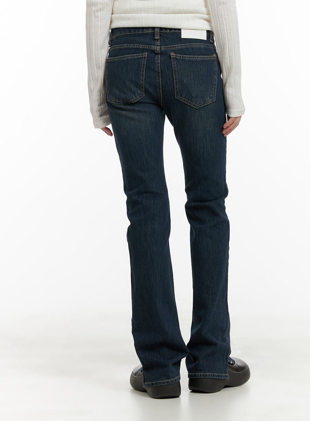 Slim Fit Bootcut Jeans CA418 in dark blue, back view on model, five-pocket construction with contrast stitching, slim fit through hip and bootcut hem, washed denim.