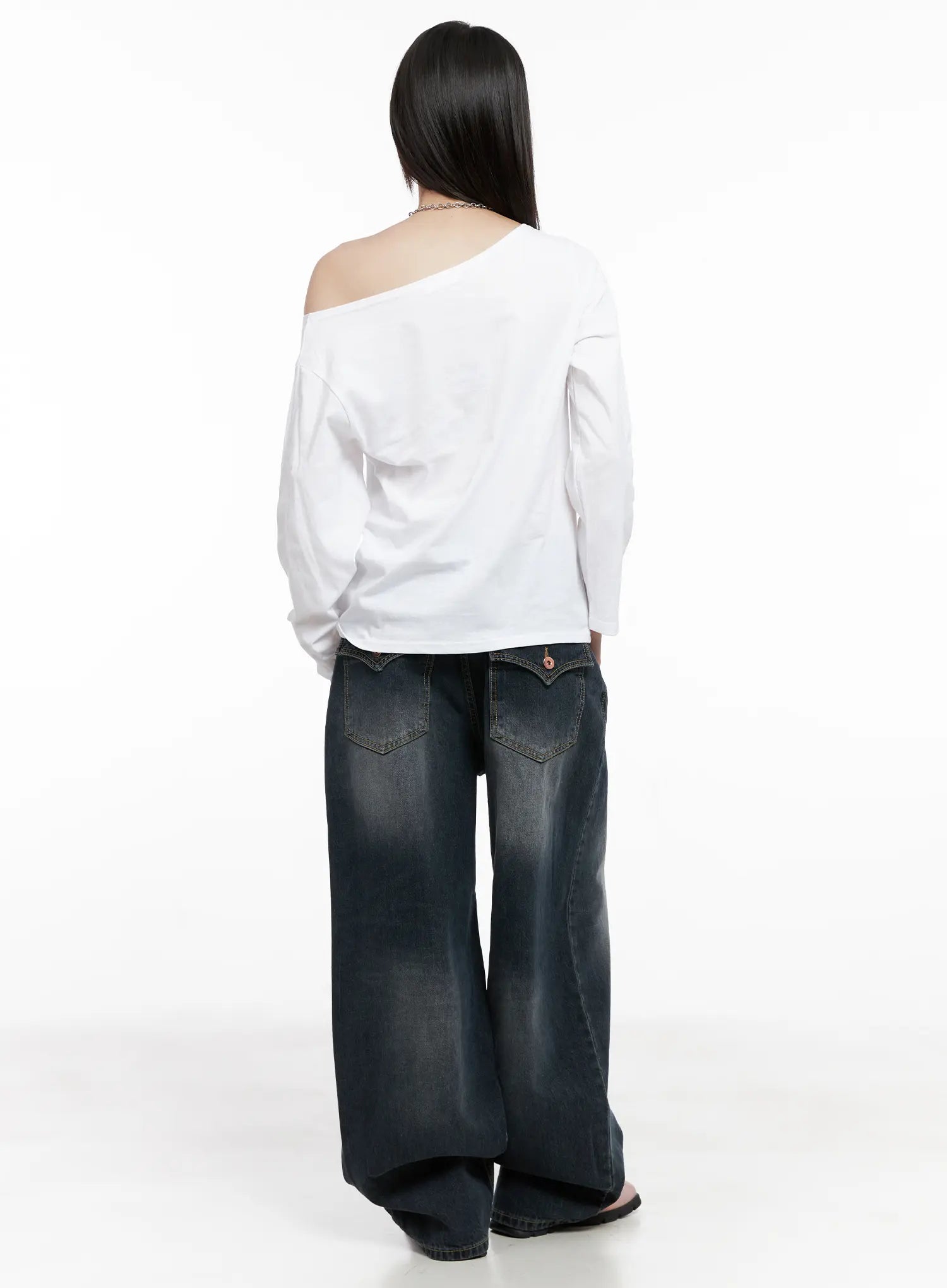 Celi Vintage Wash Wide-Leg Jeans CG515 in dark vintage wash, back full view on model, wide-leg pooling hem with back pocket detail, styled with white off-shoulder long sleeve top.