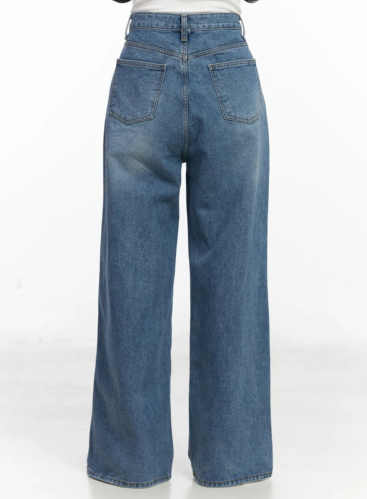 Ensley Wide Leg Jeans IJ529 in blue, back product shot on model, showing dual back patch pockets with contrast stitching, high waistband, and wide straight leg hem.