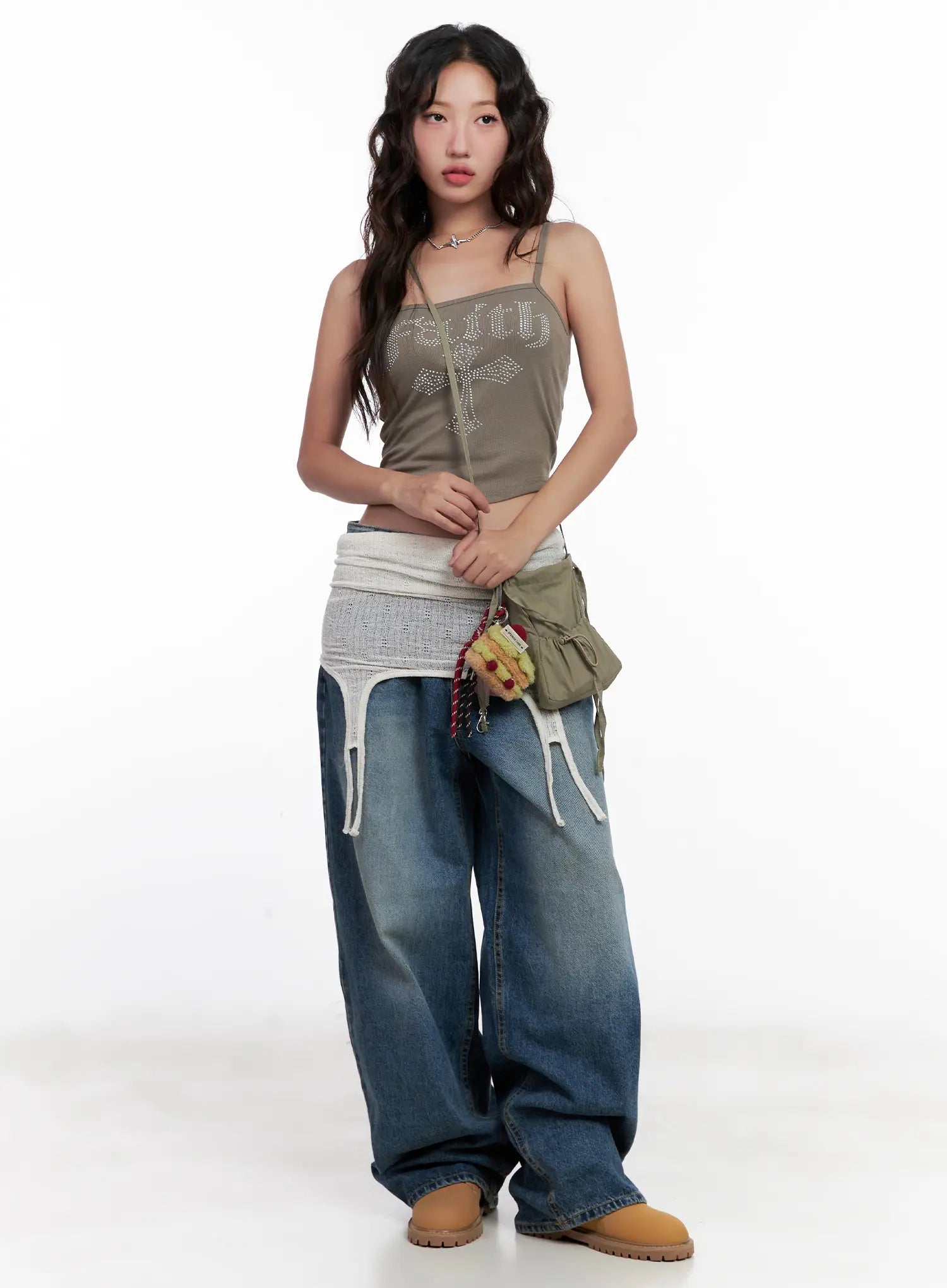 Miji Wide-Leg Washed Denim Jeans CL521 in dark blue, full-body front editorial shot on model, wide-leg washed denim layered under a knit wrap skirt with garter straps and mini bag, acubi K-fashion styling.