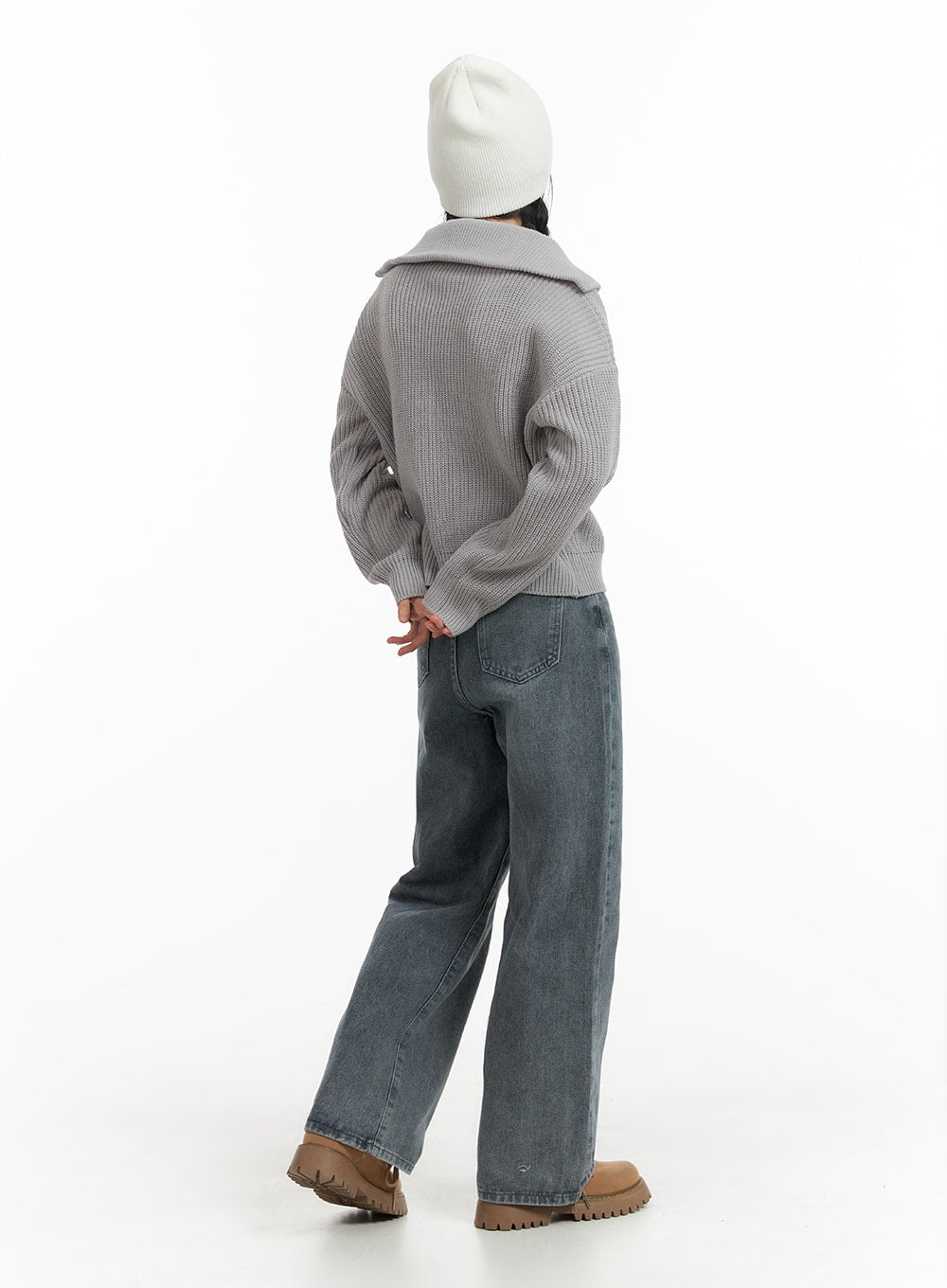 Blue Washed Straight Jeans OM408 in gray, back full-body view on model, straight-fit washed denim with back pockets, paired with gray knit top and chunky boots.