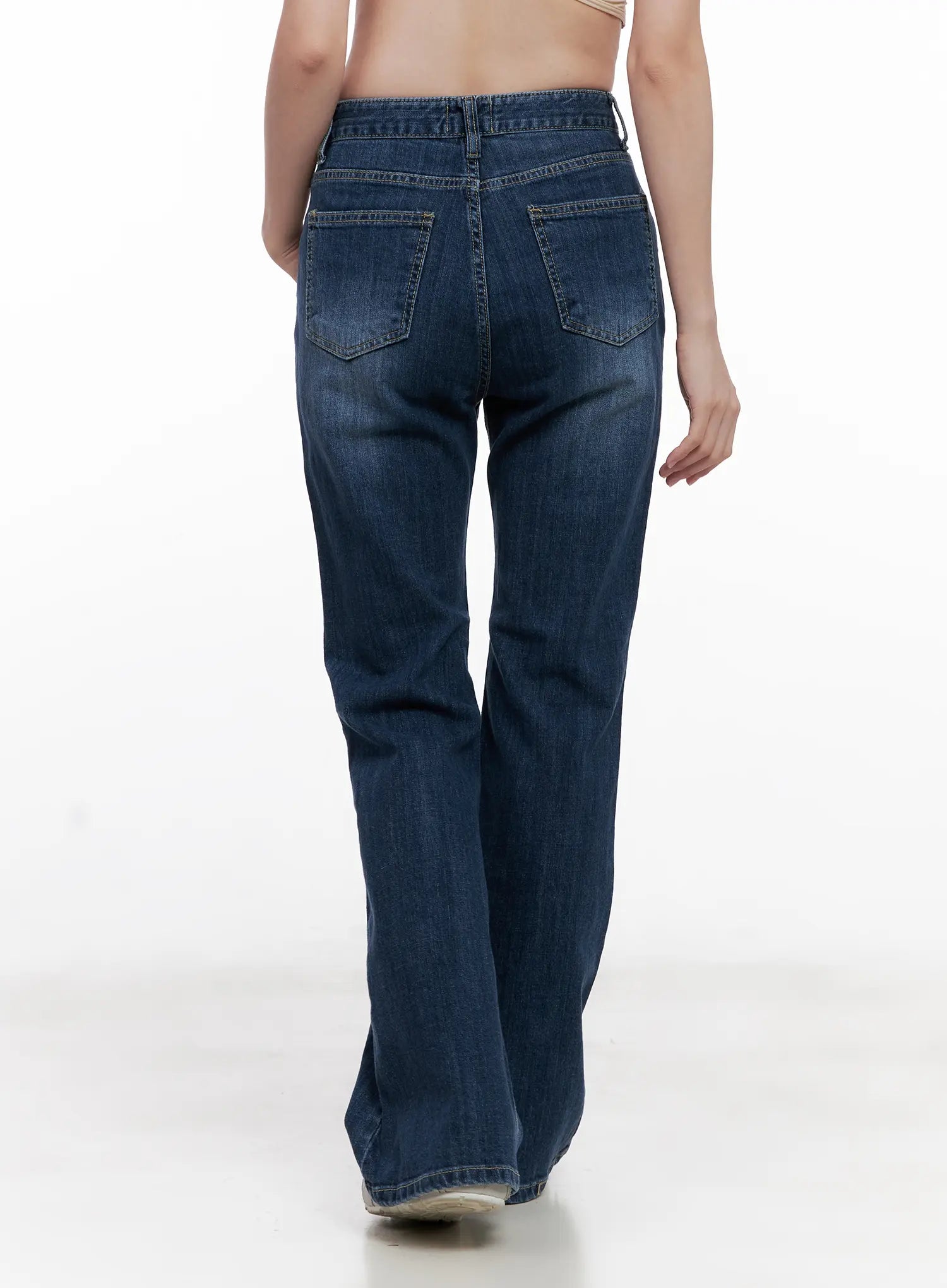 Solhee Classic Flare Denim Jeans CL524 in dark blue, back crop view on model, dual back patch pockets with contrast stitching, washed denim normal fit through hips.