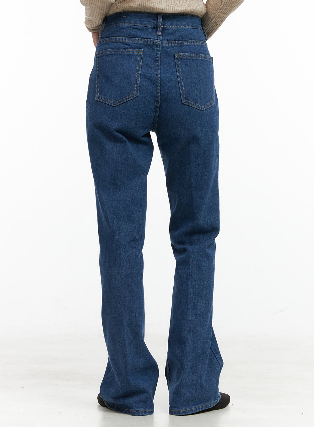 Tessa Straight Jeans OG412 in blue, back close-up on model, dual back patch pockets with contrast stitching, high-rise waistband and straight leg hem shown.