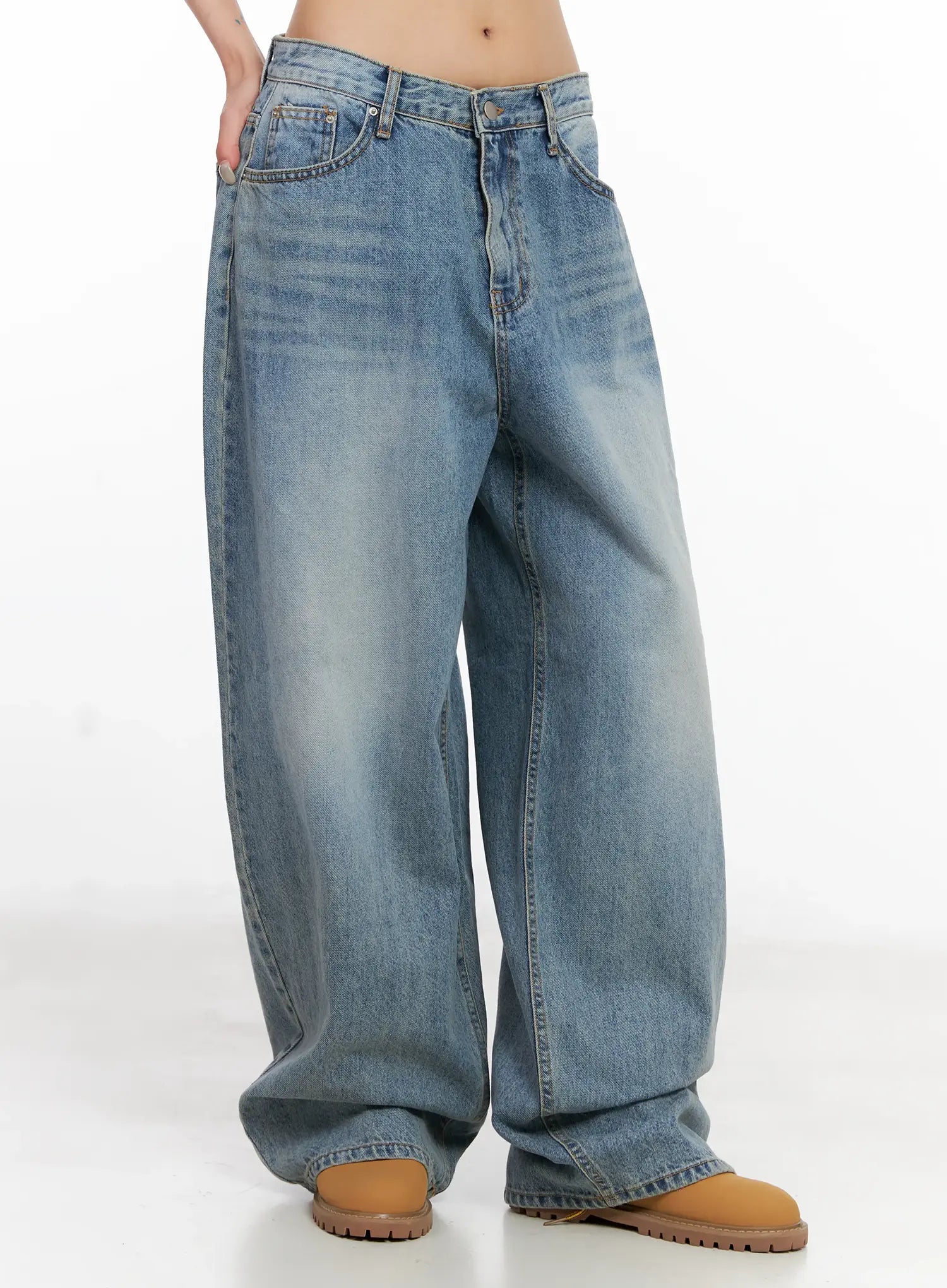Koko Vintage-Wash Baggy Jeans CL528 in blue, side-angle waist-to-hem shot on model, highlighting wide-leg silhouette and faded wash gradient on cotton denim.
