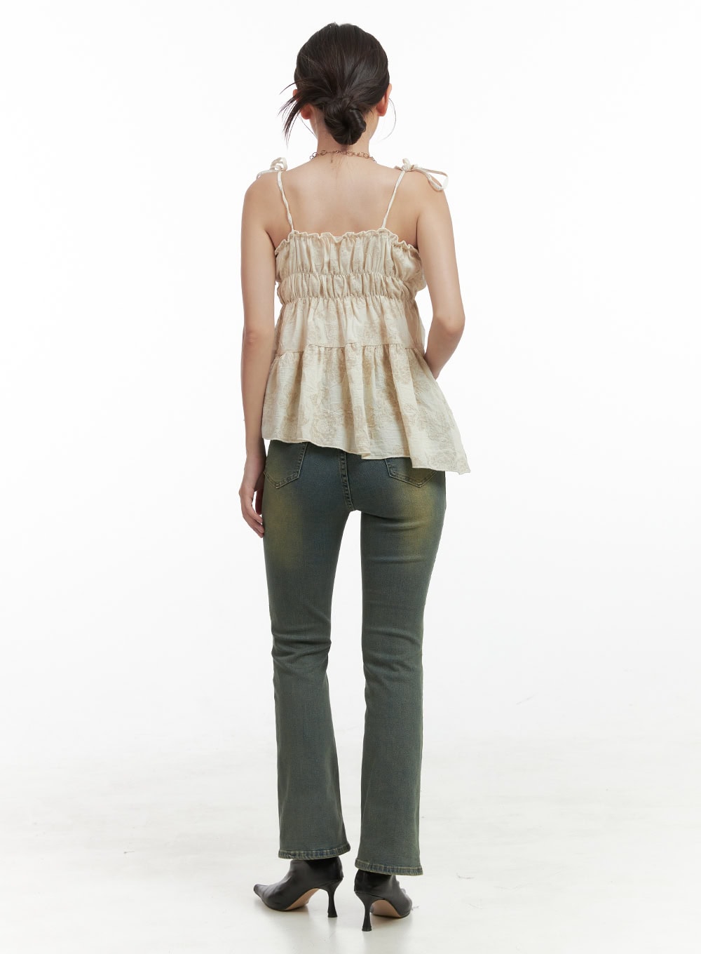 Pamela Belt Bootcut Jeans OG407 in Yellow, back full-length view on model, washed slim bootcut denim highlighting rear pocket detail and subtle flare, styled with a tiered cami top.