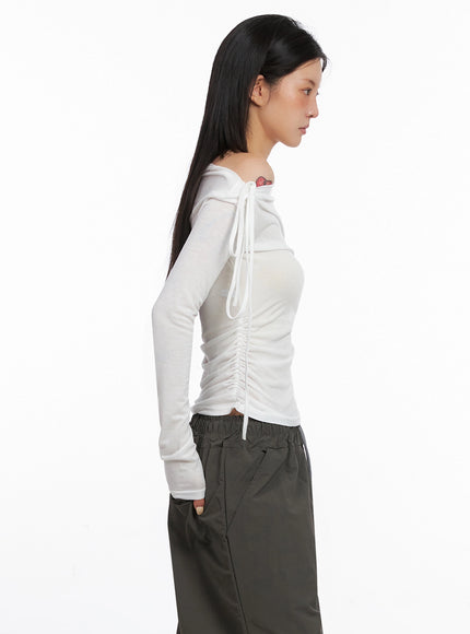 assymetric-cut-out-long-sleeve-top