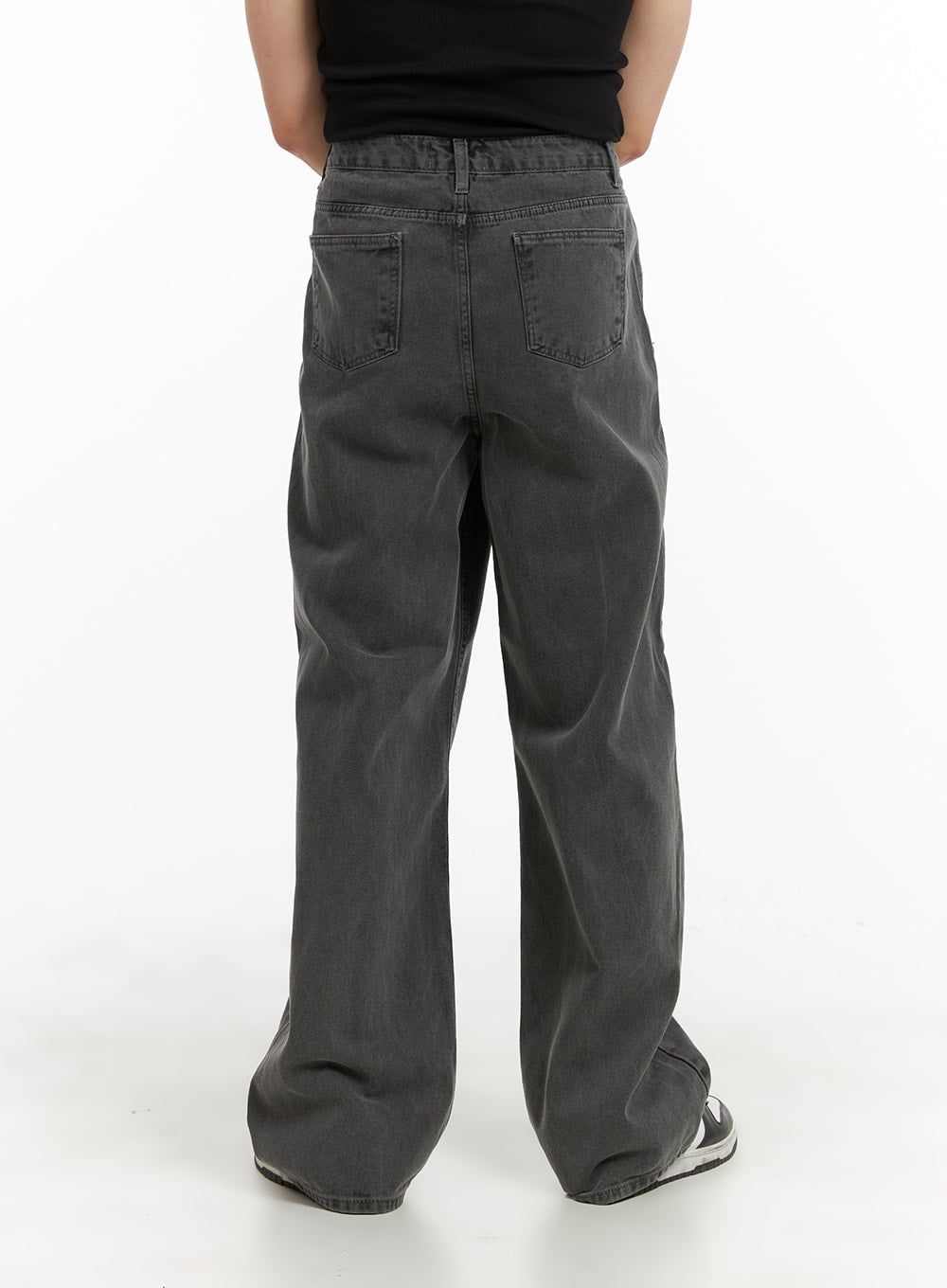 Men's Classic Baggy Fit Jeans IA401 in washed grey, back view on model, dual back patch pockets, wide-leg hem pooling slightly at sneakers, relaxed fit denim.