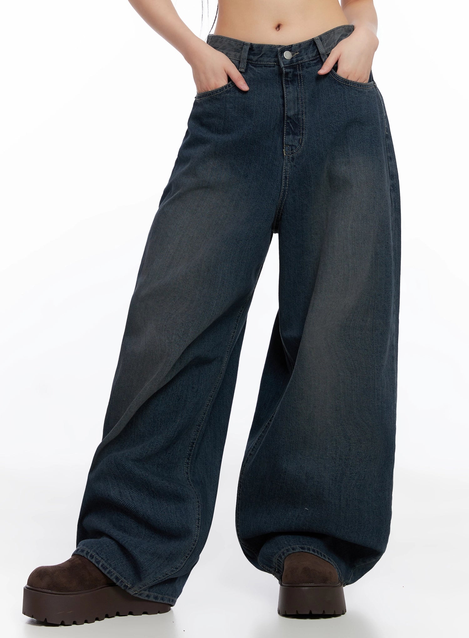 Adelyn Washed Baggy Jeans IS525 in dark blue, three-quarter front shot on model hands in pockets, showcasing wide baggy leg silhouette, washed fade, and full-length oversize fit.