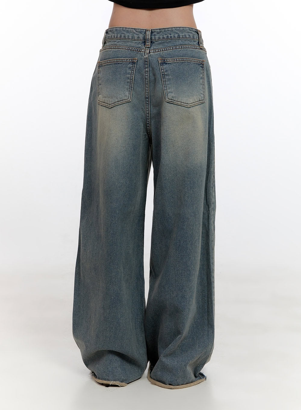 Felicia Cotton Wide Fit Baggy Jeans CN425 in blue, back product shot waist to hem, washed cotton denim, two back patch pockets with contrast stitching, wide-leg silhouette, frayed raw hem at floor.
