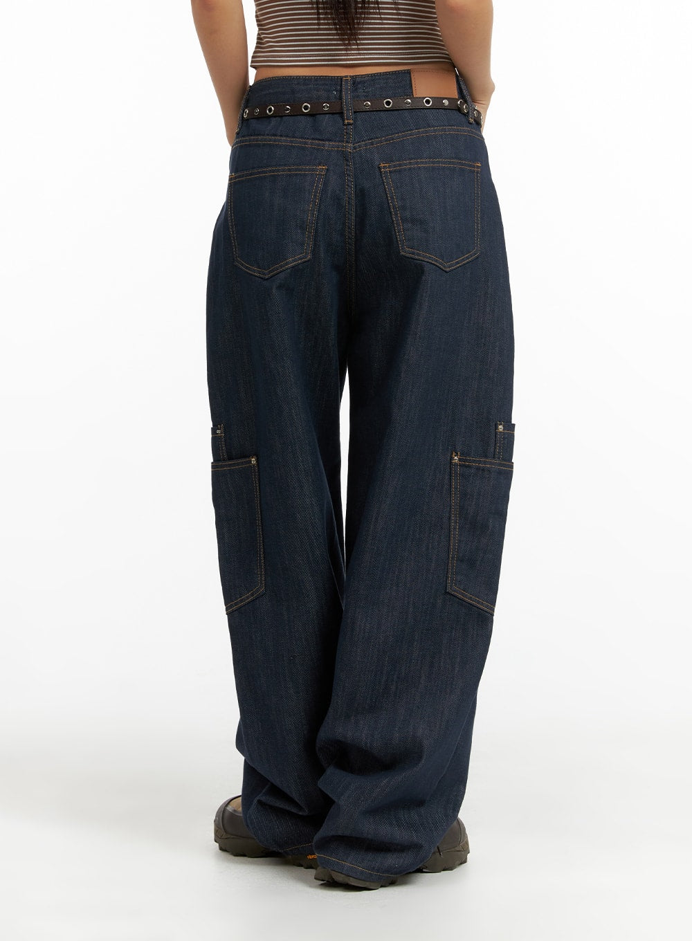 Pocketed Denim Wide Leg Jeans CF423 in dark blue, back view on model, back yoke pockets with contrast stitching, rear cargo pockets, eyelet belt detail, wide leg hem pooling at ankle.