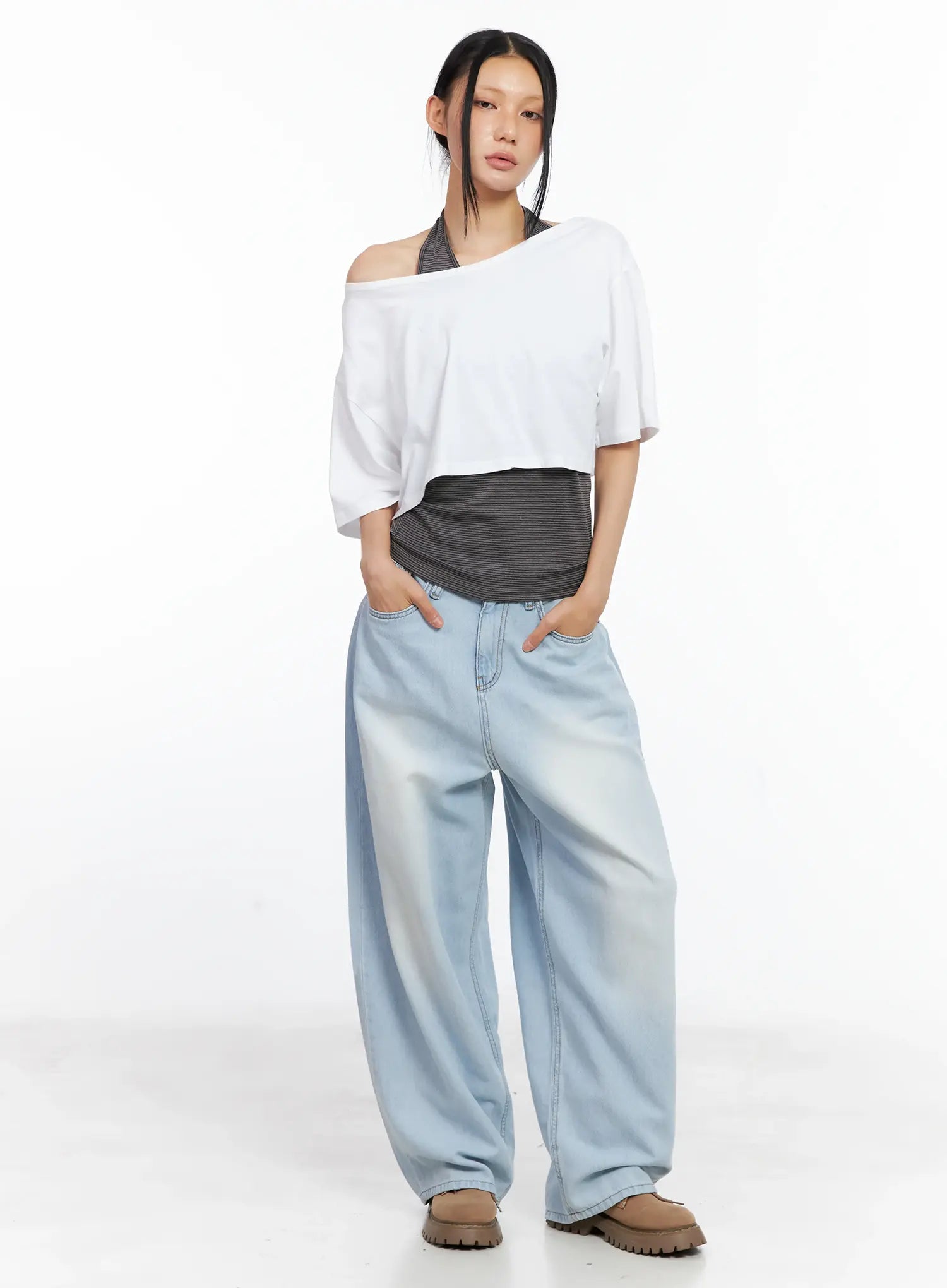Bona Relaxed-Fit Denim Jeans CL529 in light blue, full-body front on model facing camera, hands in pockets, wide-leg washed denim with relaxed fit, paired with white off-shoulder top and gray inner.