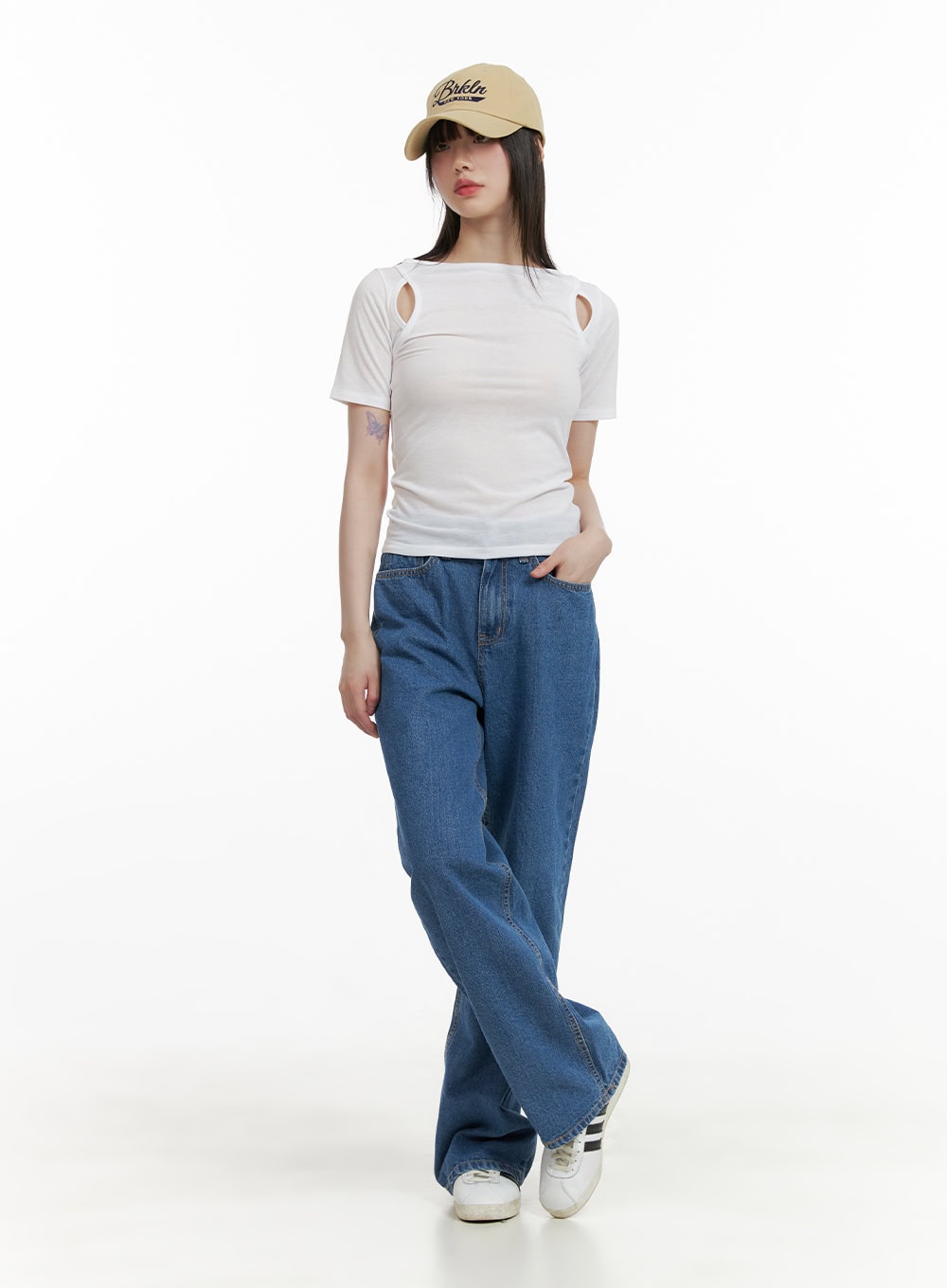 Blue Straight Leg Jeans CY428 in blue, full-body front shot on model walking, wide-fit washed denim paired with white cut-out shoulder tee and cap, sneakers.