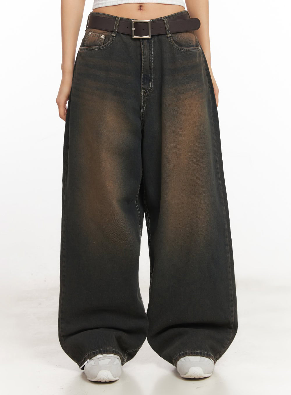 Bethany Vintage Washed Baggy Jeans IA524 in dark brown washed denim, front waist-to-hem close-up on model, high-rise with contrast stitching, brown belt, visible pocket detail and wide draped leg.