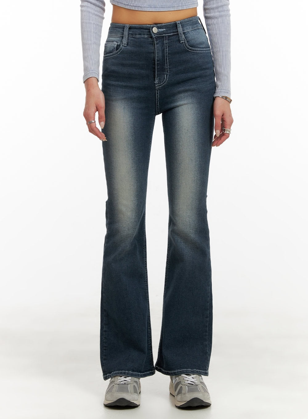 Washed Denim Slim Fit Bootcut Jeans CY402 in blue, front waist-to-hem close-up on model, highlighting faded wash, contrast topstitching, button closure, and slim fit through thigh into bootcut.