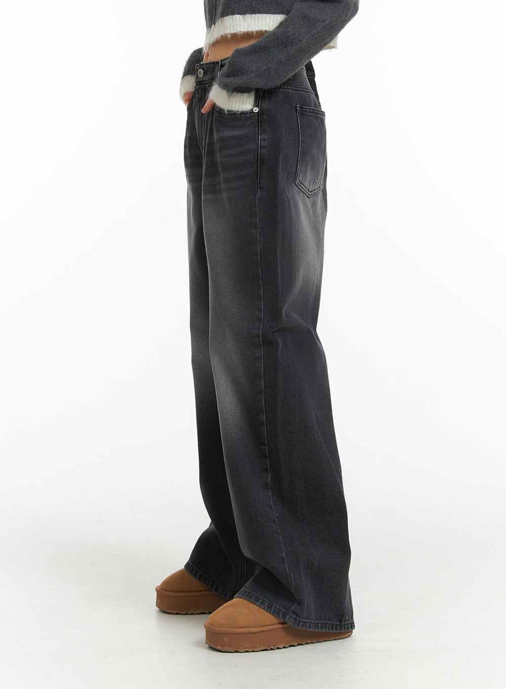 Denim Mid-Waist Pocket Wide Leg Jeans CJ415 in washed black, side close-up on model, showing back pocket placement and wide-leg drape, washed denim with gradient fade from waist to hem.