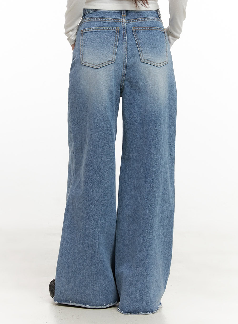 Melody Chic Flare Wide Leg Jeans CN428 in light blue, back product shot from waist down, showing dual back pockets with contrast stitching, wide flare leg, and raw destroyed hem on washed denim.
