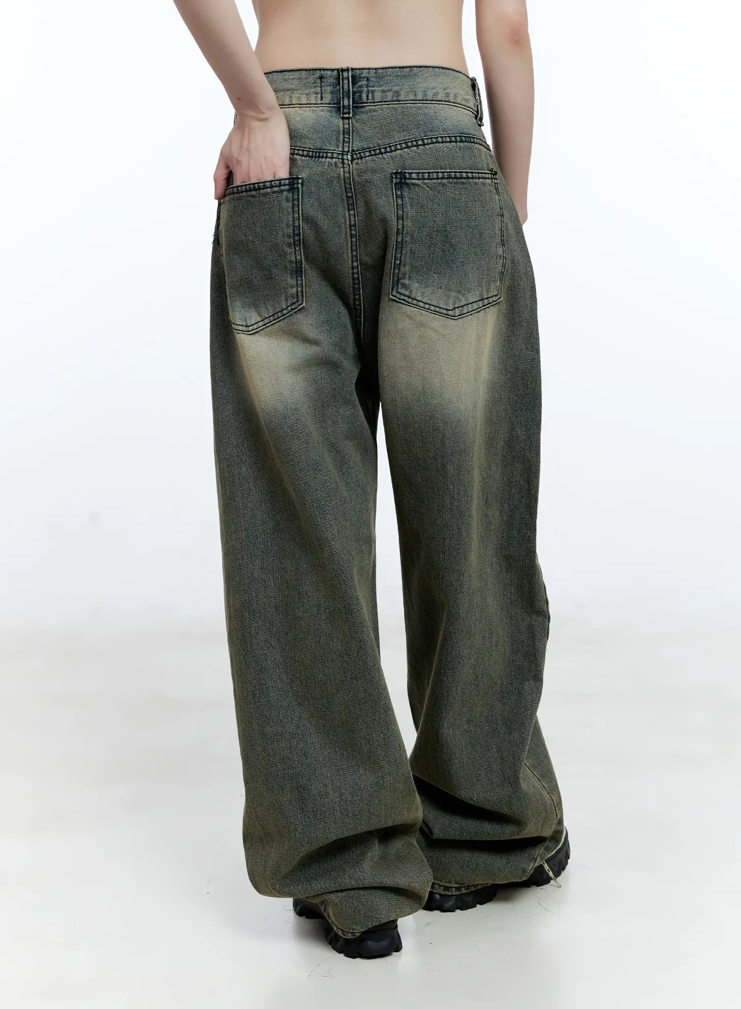Yeonsoo Vintage-Wash Wide-Leg Jeans CG507 in vintage blue, back view on model, dual back patch pockets with contrast stitching, yellow-tinted vintage wash across seat and thighs.
