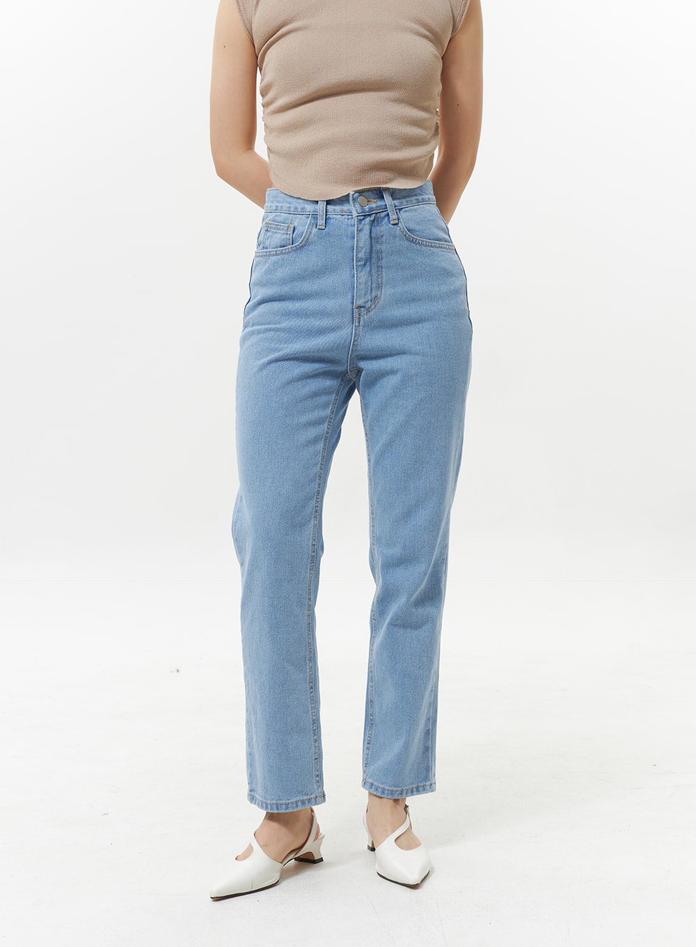 High Waist Jeans OY330 in light blue, cropped front close-up on model, highlighting high waist band, button fly, and front coin pocket detail with straight-leg denim.