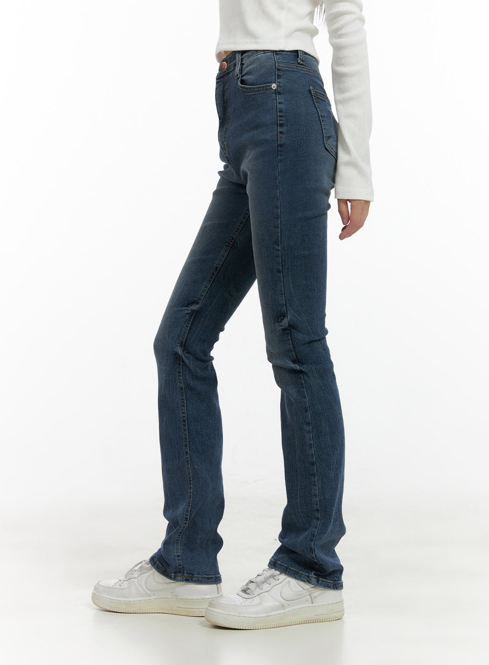 Pixie Slim Washed Bootcut Jeans CG427 in blue, close-up side shot from waist to hem, highlighting slim fit, washed denim texture, coin pocket, and slight bootcut flare at ankle.