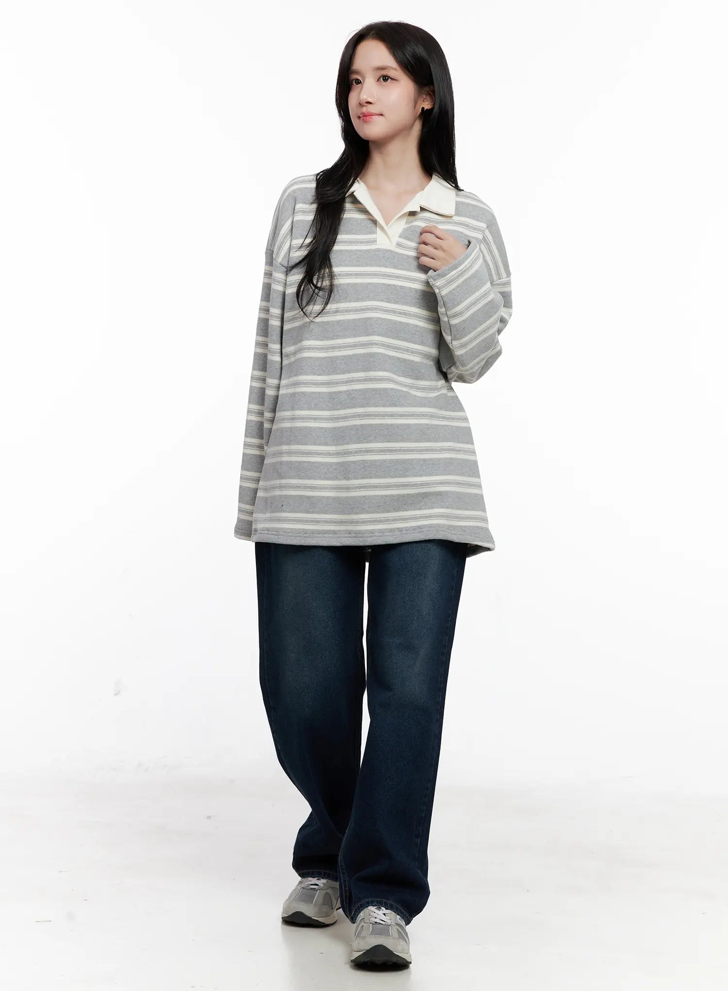 Shiloh Washed Semi-Wide Jeans CO524 in dark blue, full-body front styling on model in striped oversized polo, wide-leg length grazing sneakers, casual everyday outfit.