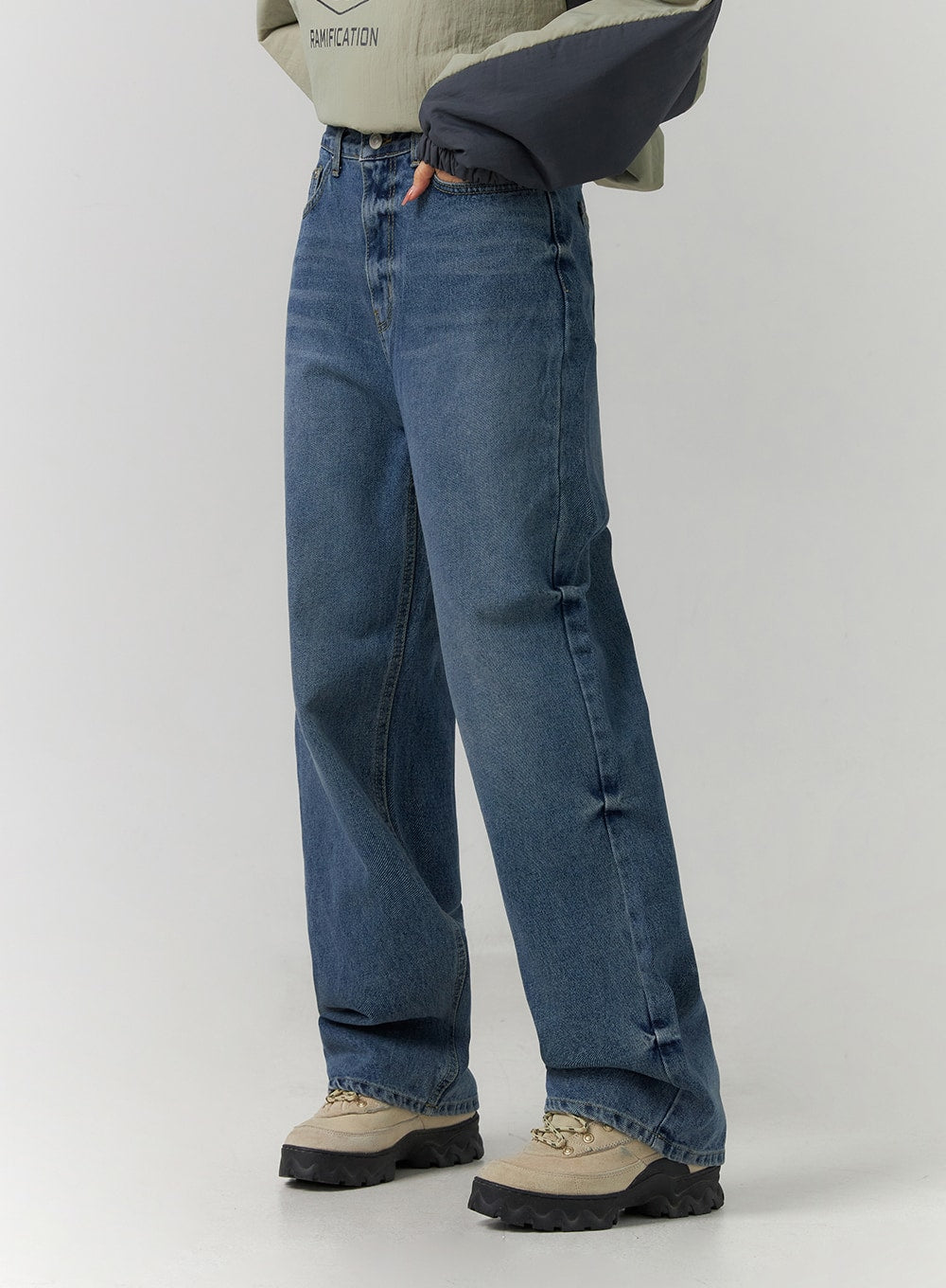 Washed Denim Wide Leg Jeans CD308 in blue, side close-up from hip to hem on model, wide leg silhouette, washed denim with light fading, regular inseam length.