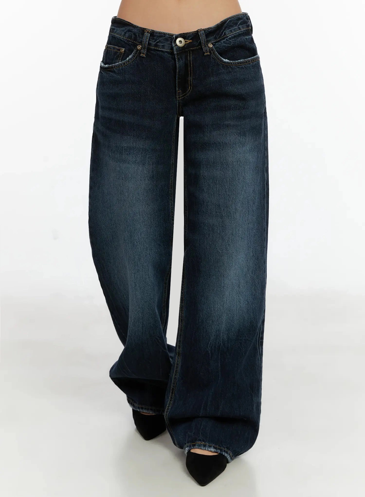 Aimee Low Rise Wide Leg Jeans ID525 in dark blue wash, front product close-up from waist to hem on model, wide leg drape, washed denim with fading, low-rise fit and long length.