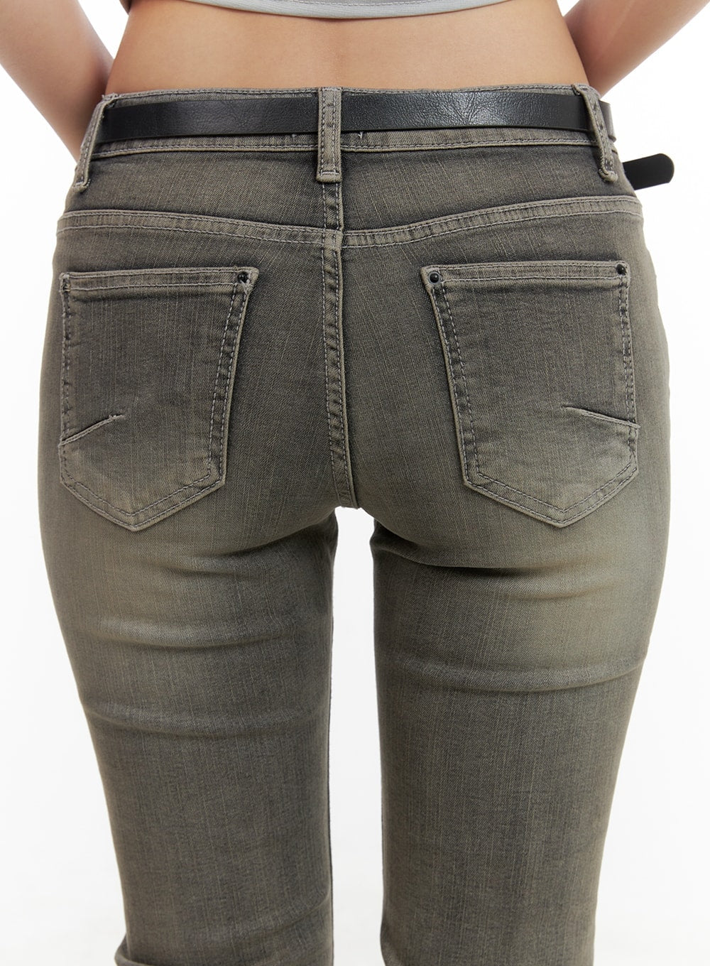 Low Rise Bootcut Jeans CA416 in dark gray, close-up back detail on model, dual patch pockets with bar-tack stitching, low waist with black leather belt, washed cotton-spandex denim.