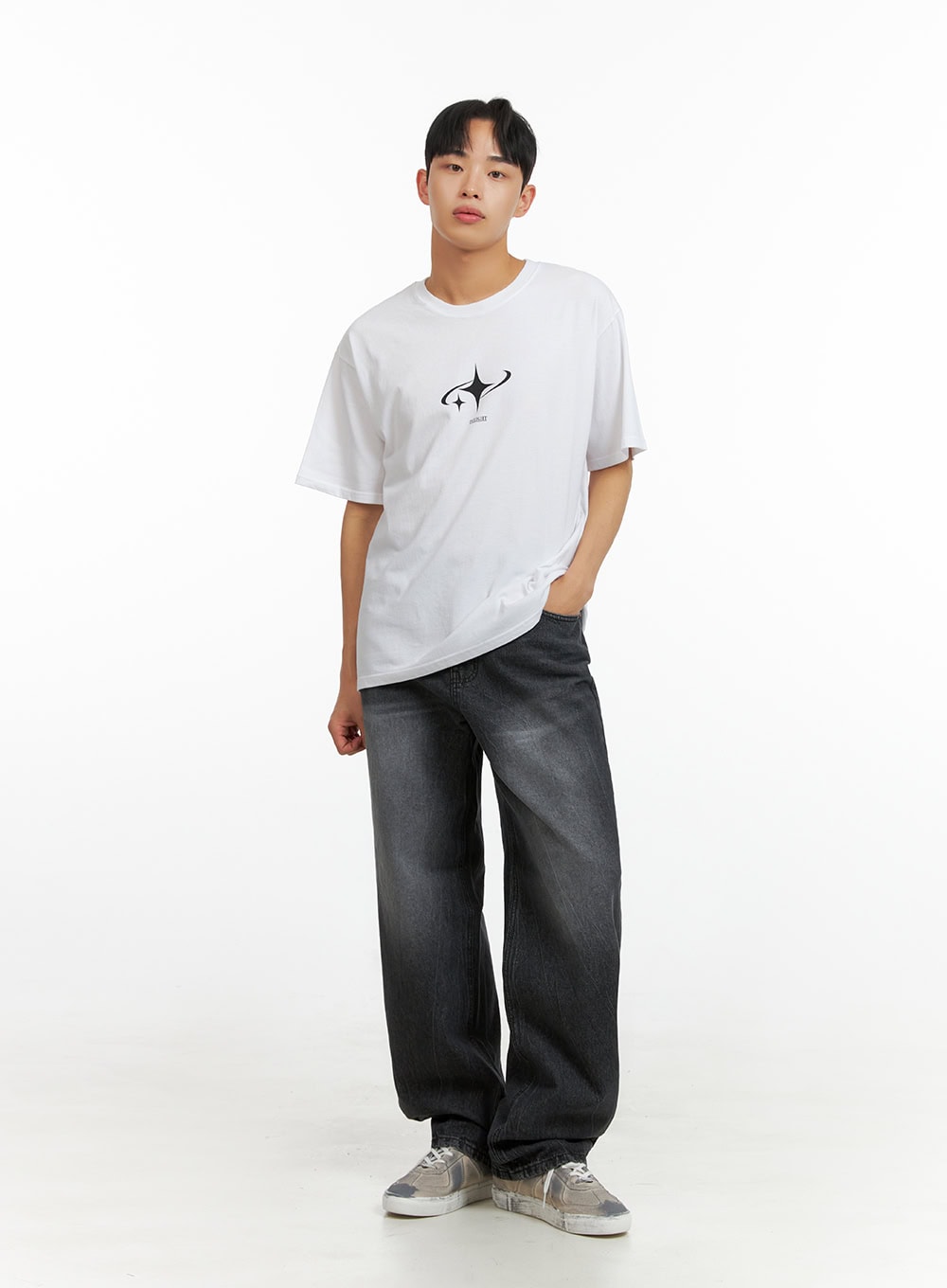 Men's Loose Fit Straight Jeans IU412 in washed black, full-length front view on model, relaxed straight fit with washed fading, hand in pocket, styled with white graphic tee and grey sneakers.
