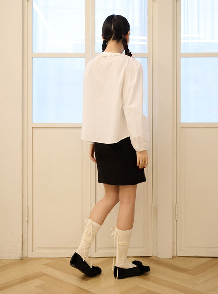 round-neck-ruffle-hem-long-sleeve-blouse-od326