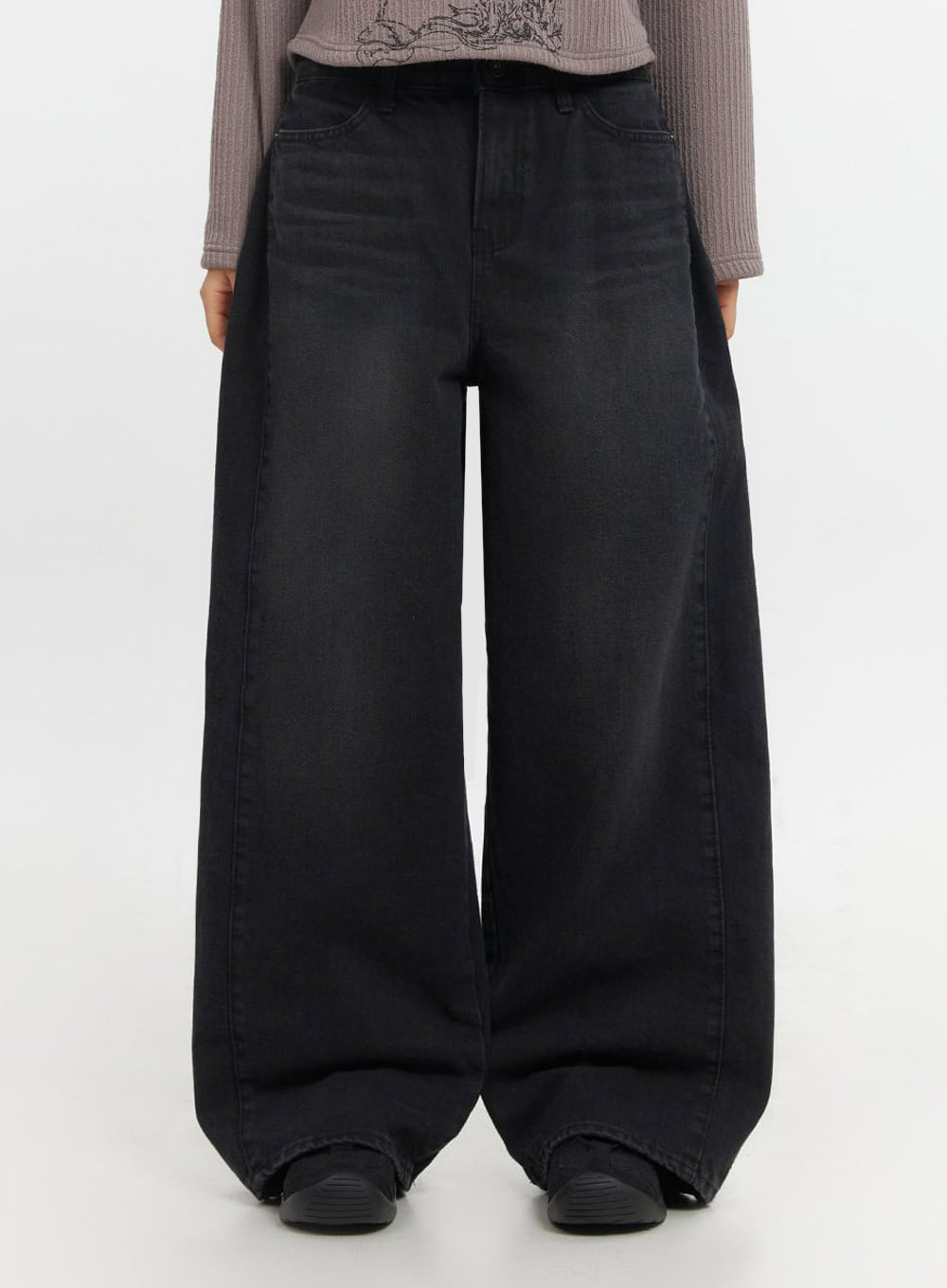 Ashly Wide-Leg Jeans IF511 in washed black, front lower-body close-up on model, ultra-wide leg opening with floor-grazing hem, washed cotton denim with slight fade.