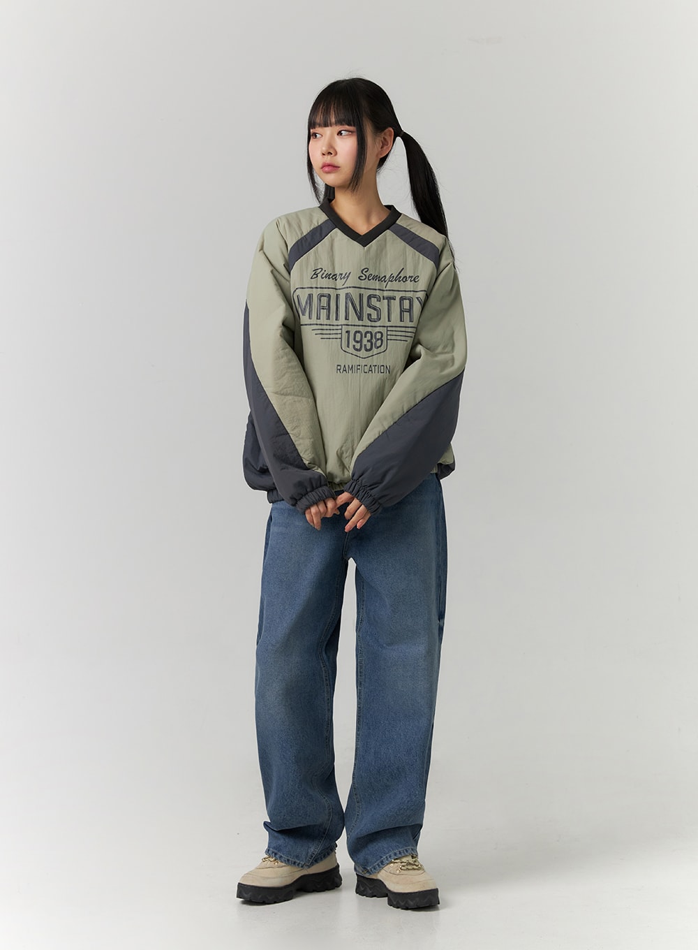 Washed Denim Wide Leg Jeans CD308 in blue, front full-length on model facing slightly away, wide-fit washed denim, relaxed street style, paired with graphic pullover and chunky shoes.