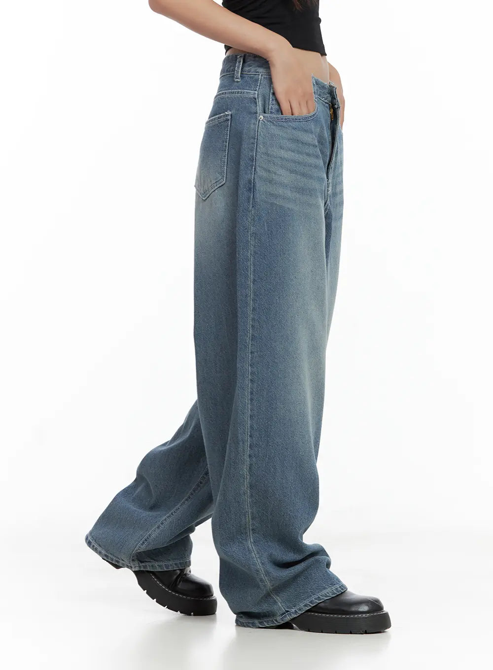 Riwon Retro-Wash Wide Summer Denim Jeans CL508 in blue, angled side view on model showing full leg length and hem pooling at ankle, retro-washed cotton denim, chunky loafers.