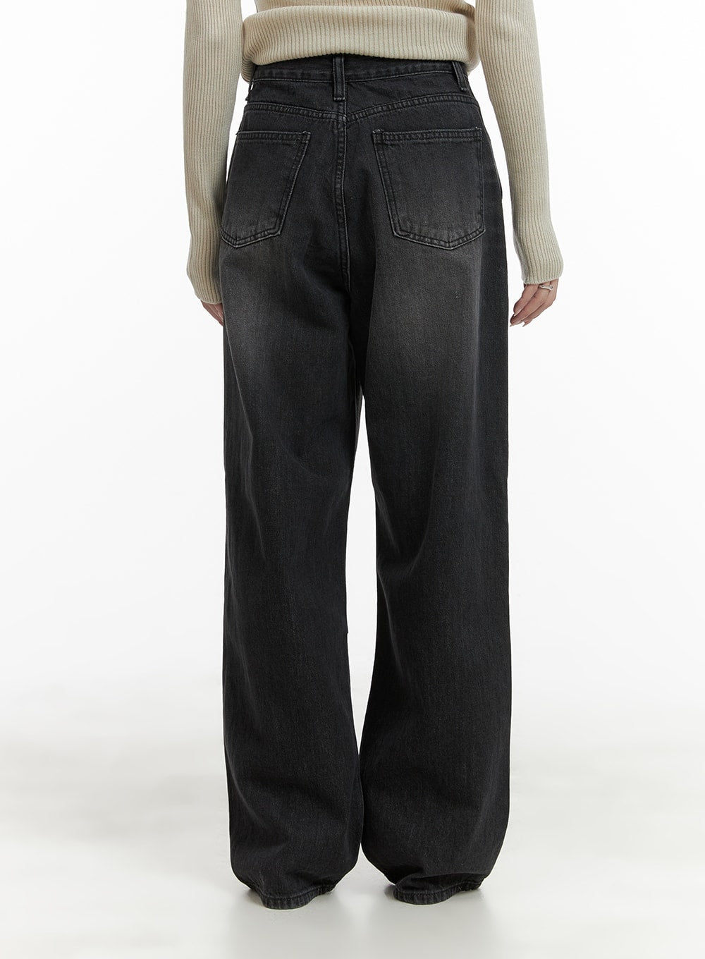 Pintuck Washed Wide Leg Jeans CA403 in Black, back view on model, two back patch pockets with contrast stitching, washed fade across seat, wide leg cotton denim falling straight to floor.