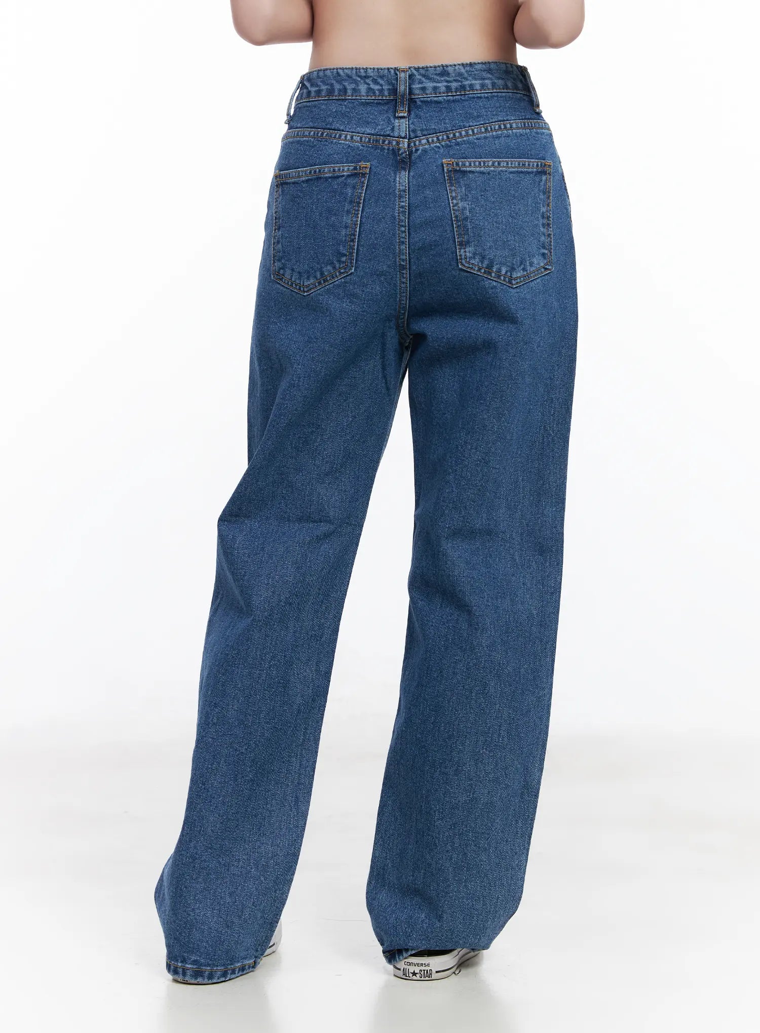 Aila Relaxed Fit Jeans CJ519 in blue, back product shot on model, dual back pockets with contrast stitching, wide-leg long length, washed cotton denim.