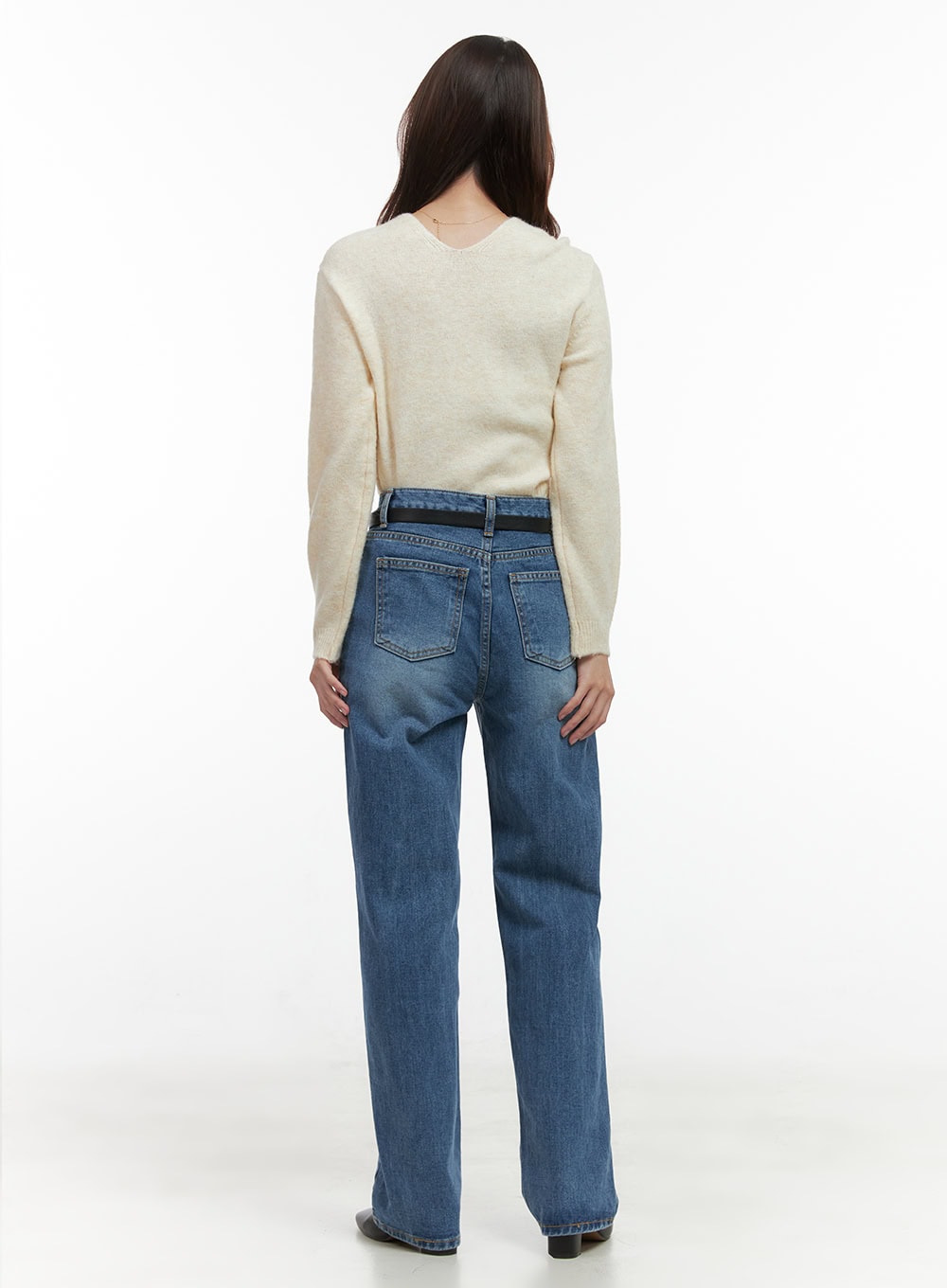 Evelyn Wide-Fit Straight Denim Jeans OO421 in Blue, back full-length on model, high-rise waist with black belt, wide straight leg, paired with cream knit top from behind.