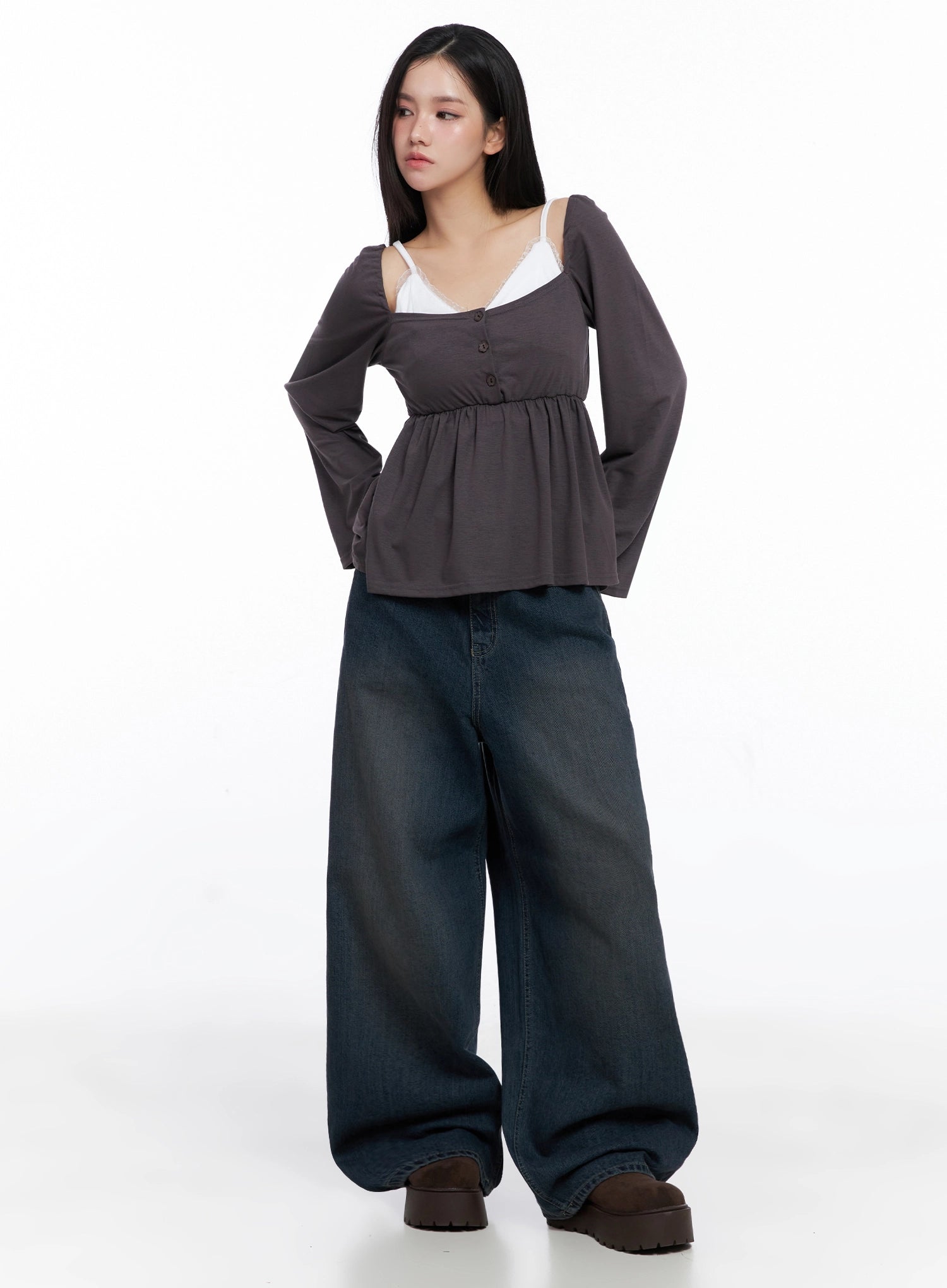 Adelyn Washed Baggy Jeans IS525 in dark blue, front full-body shot on model, oversize wide-leg washed denim paired with charcoal peplum top and white lace cami, brown platform shoes.