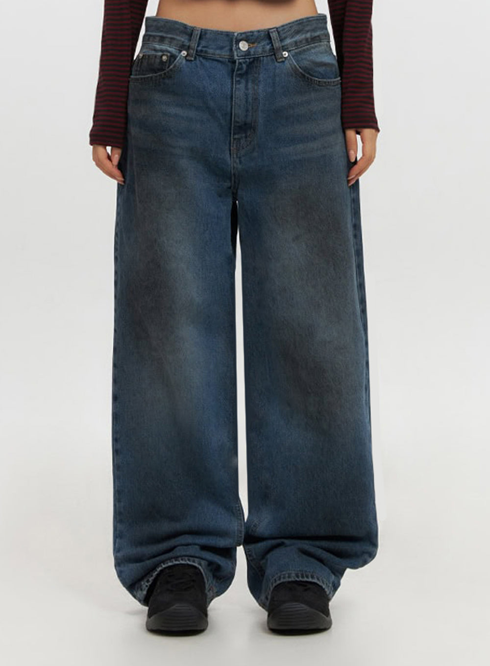 Brianna Dark Washed Wide-Leg Jeans IF510 in dark washed blue, front cropped-torso shot, full wide-leg sweep shown, dark cloudy wash gradient across baggy denim legs, hem stacking at sneakers.