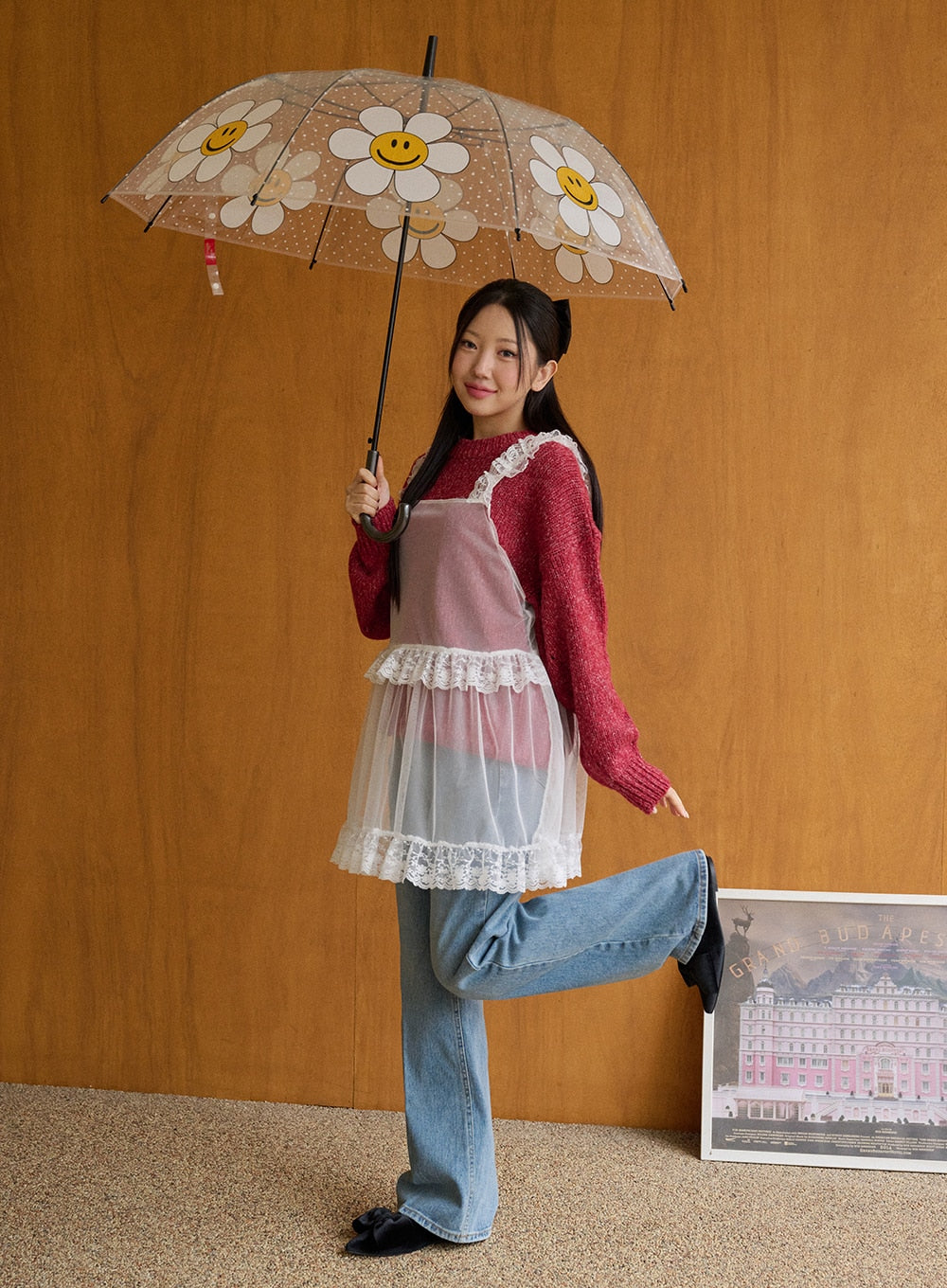 Casual Denim Solid Straight Leg Jeans OD326 in blue, side editorial shot on model with daisy umbrella, wide-leg washed denim hem visible, layered with red knit and sheer lace cami over top.