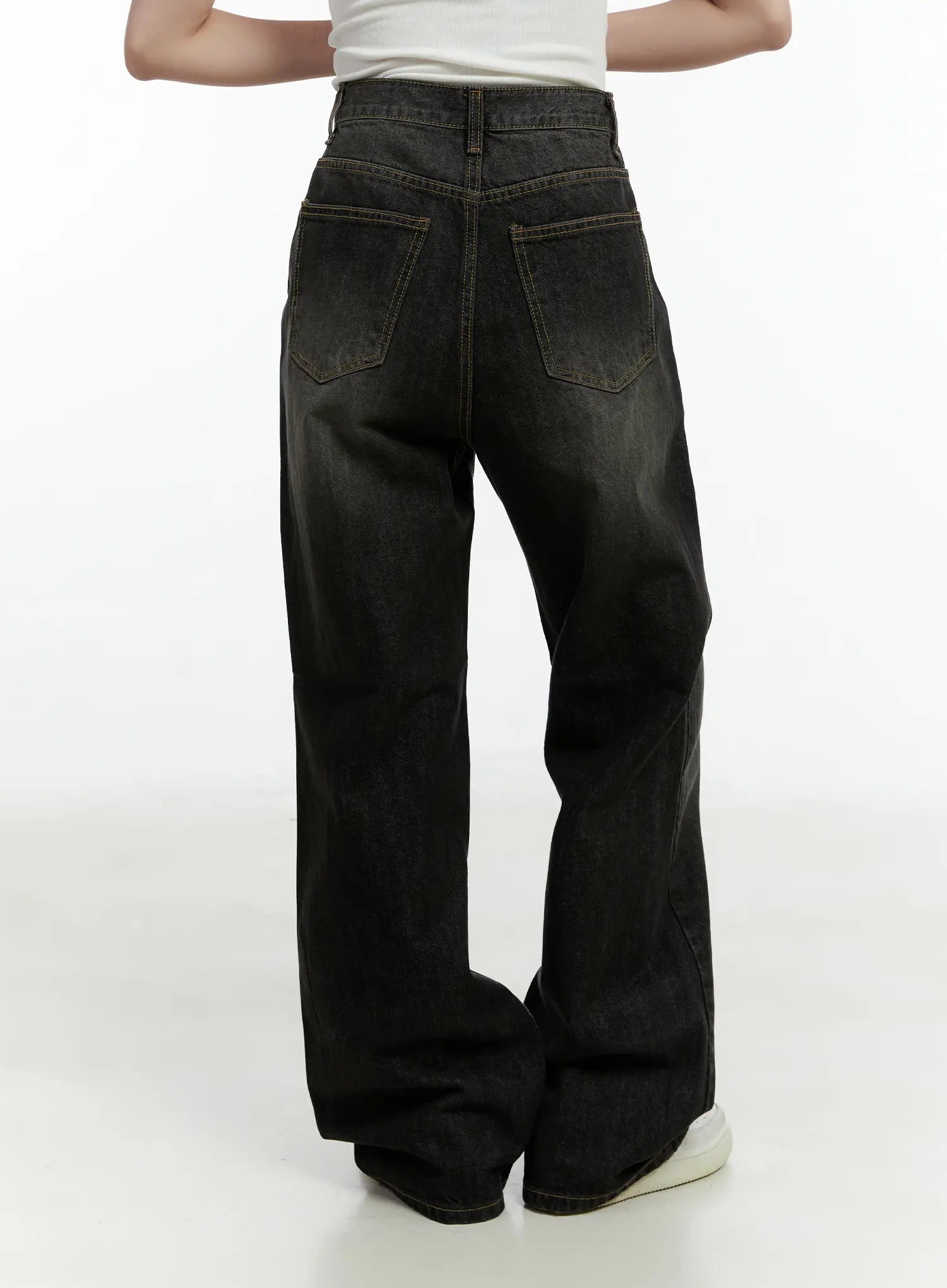 Haze Washed Wide-Leg Jeans CD523 in black, back view on model, featuring two large back pockets with contrast topstitching and washed denim texture, wide-fit silhouette.