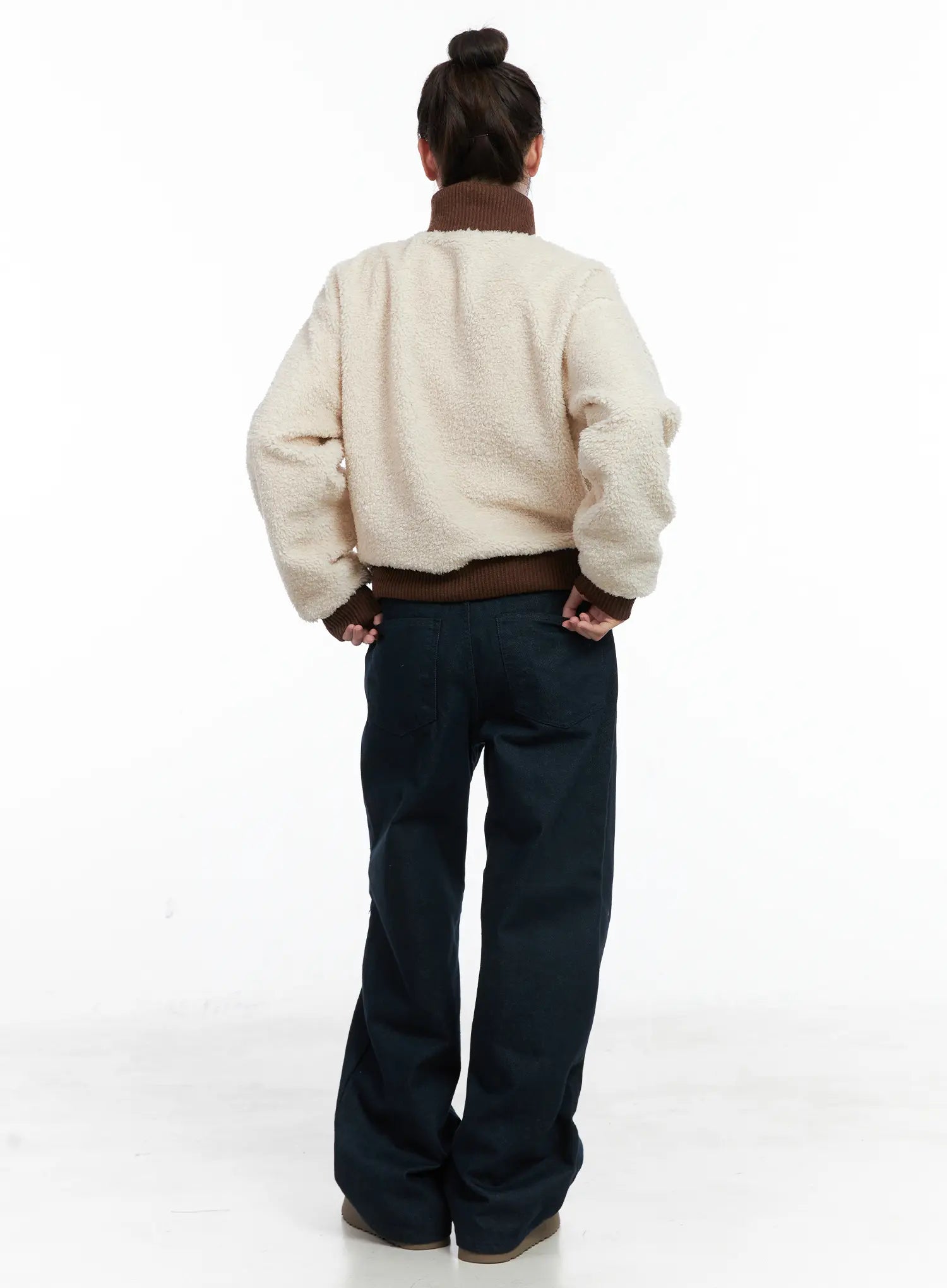 Drew Non-Fade Relaxed Fit Wide Jeans CN519 in dark blue, back full-body styling shot, model in cream boucle jacket, wide leg jeans with generous floor-length hem.