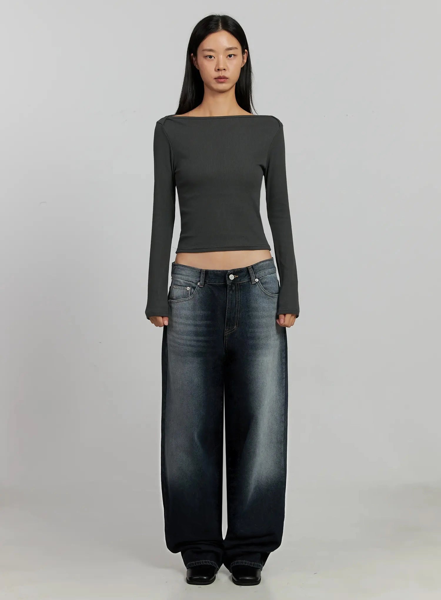 Chaya Washed Wide Jeans IJ505 in dark blue, full-body front view on model, relaxed wide-leg long length with washed finish, paired with grey crop long-sleeve top and black boots.