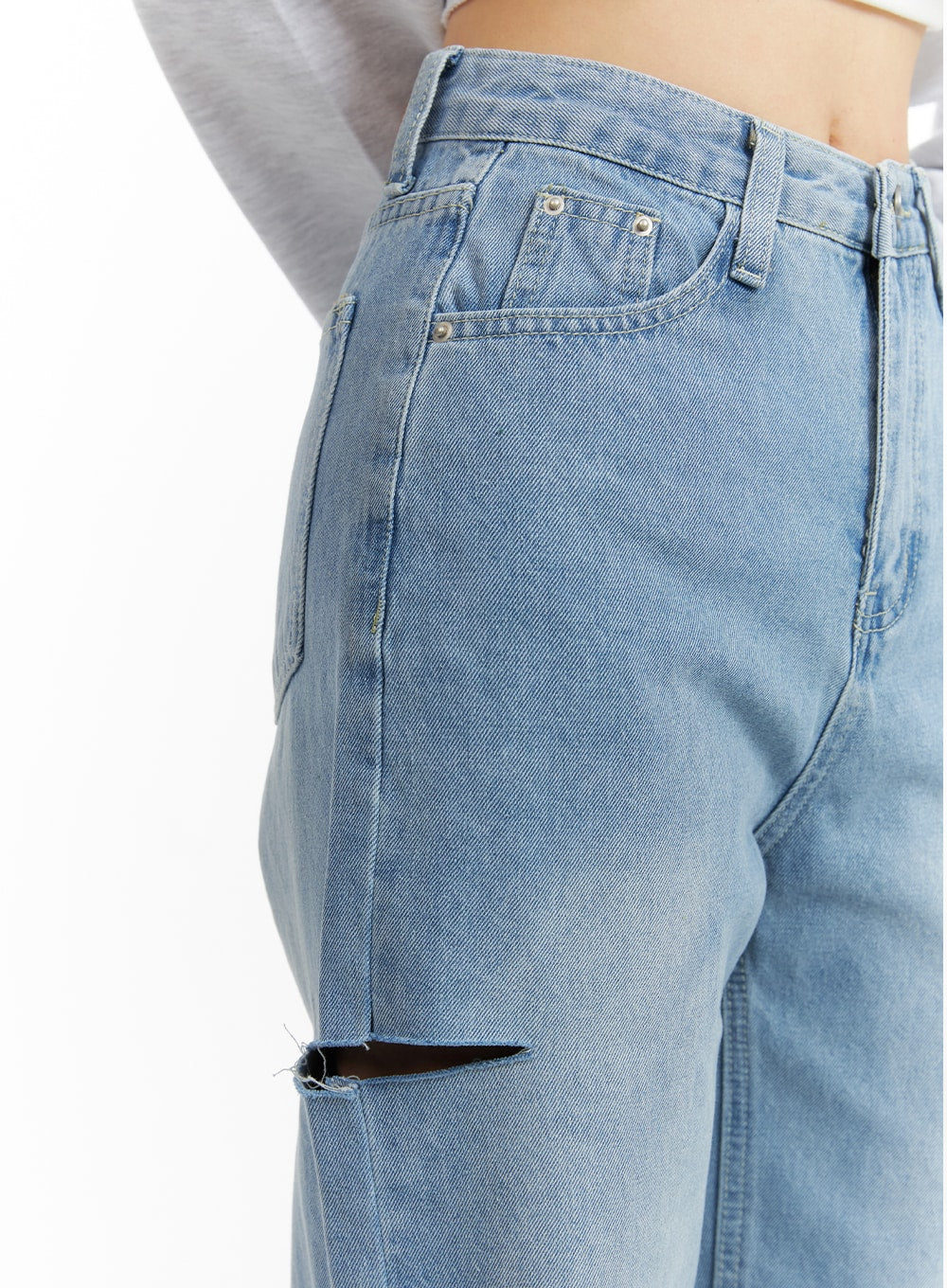Cut Out Washed Straight Jeans OM421 in blue, side close-up detail of hip and thigh, showing high-rise waistband, coin pocket, washed denim texture, and upper edge of cut-out slit.