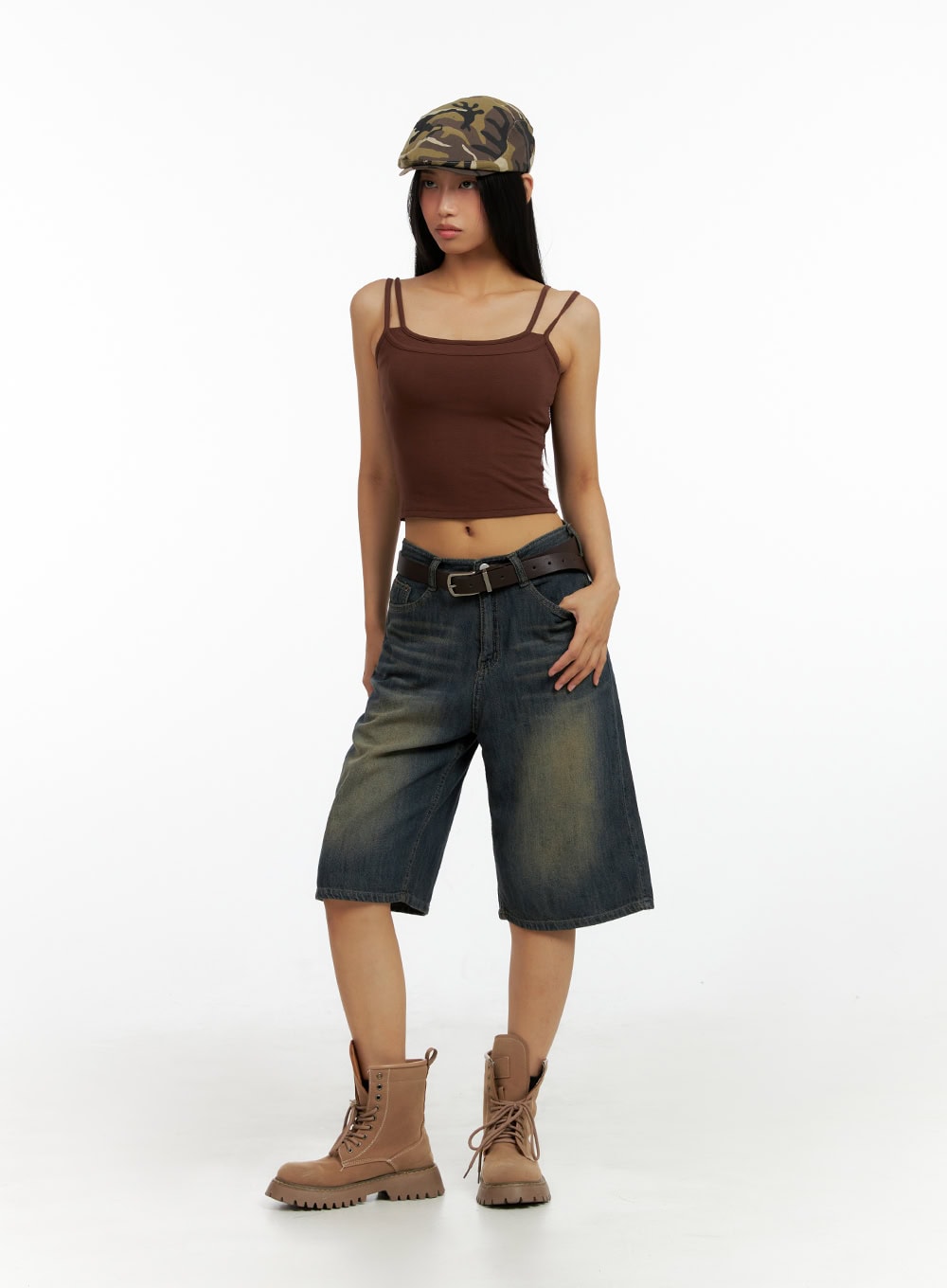 Dark Washed Wide Leg Jorts IL419 in dark blue, front full-length view on model with brown belt styling, wide-leg washed denim jorts paired with brown cami top and camo cap.