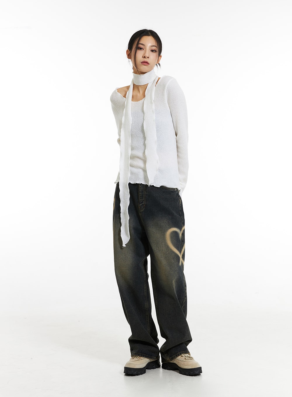 Heart-Bleached Wide Leg Jeans IN308 in dark blue, front full-body shot on model, outfit 2 styling with white sheer knit top and scarf, bleached heart motif on thigh, wide-leg floor-grazing length.