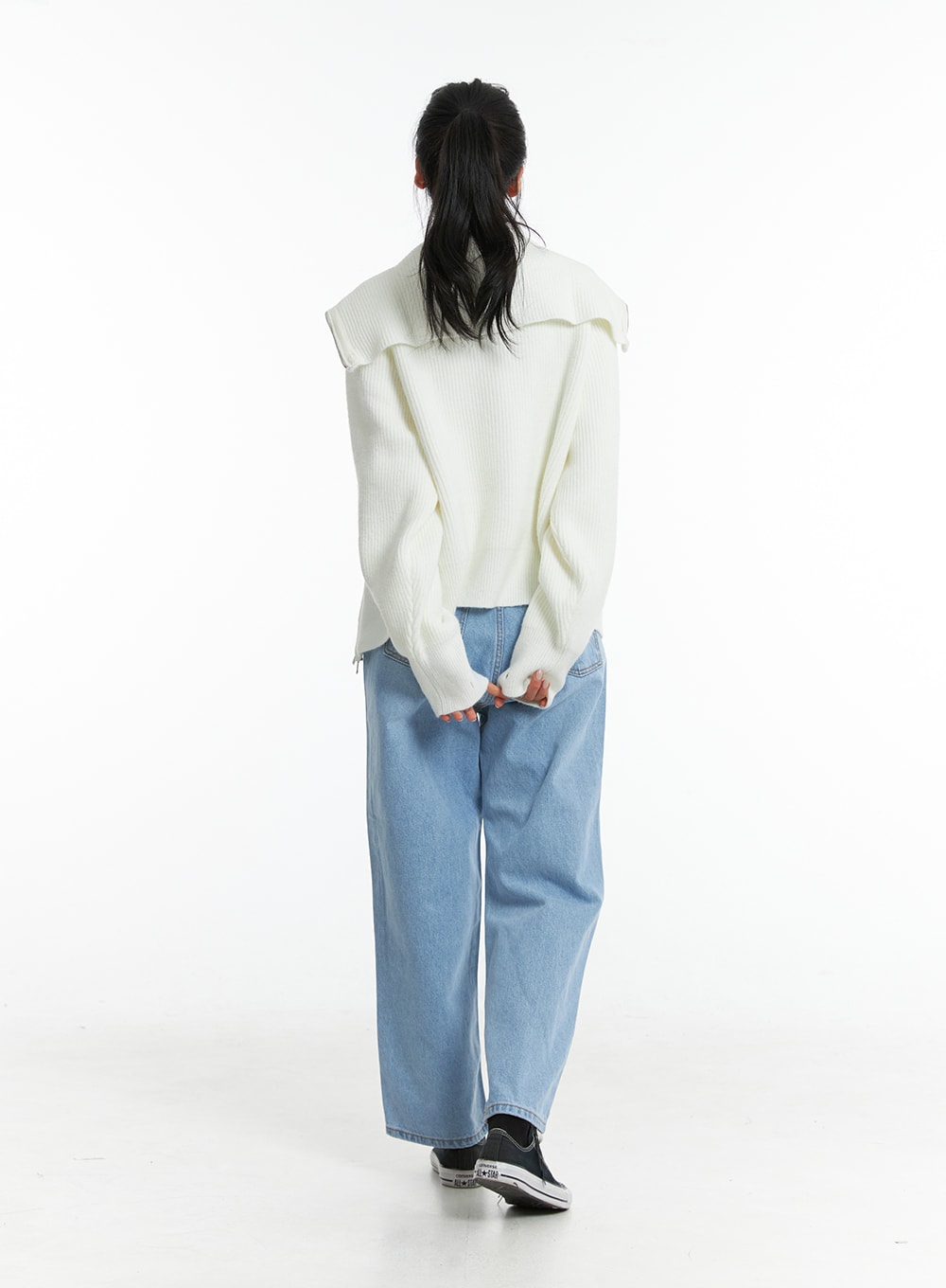 Light Washed Straight Jeans ON329 in light blue, full-body back shot on model walking away, relaxed straight-fit washed denim showing wide leg opening and ankle length.